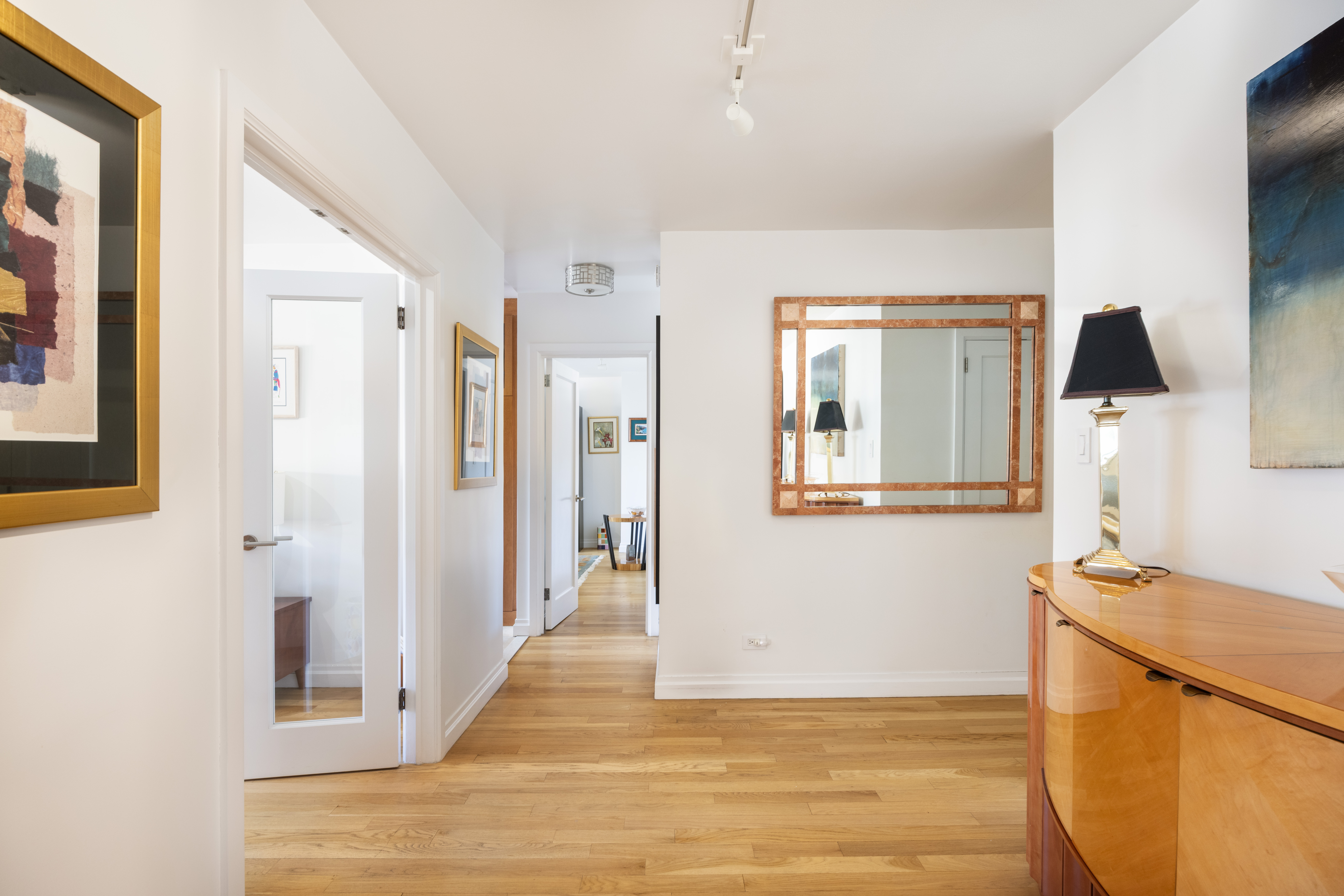 50 East 79th Street, Unit 7B Manhattan, NY 10075 - Photo 5 of 15 a view of a kitchen cabinets and wooden floor