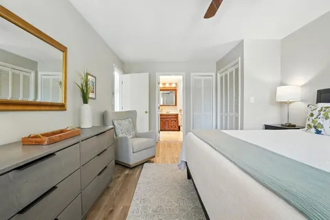 a bed room with a bed and a couch