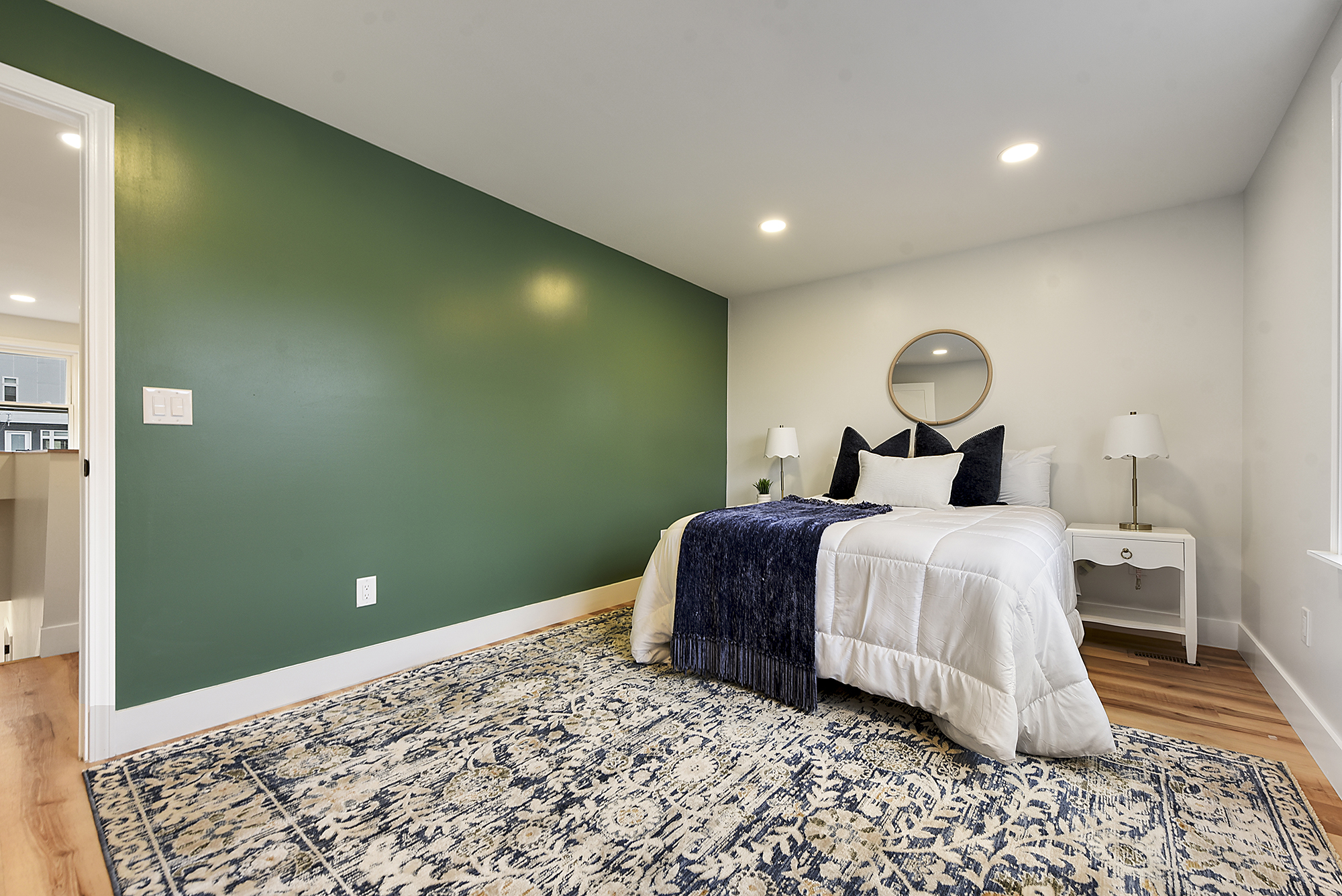 5412 Carnegie Street Pittsburgh, PA 15201 - Photo 38 of 55 a bedroom with a bed and a chandelier