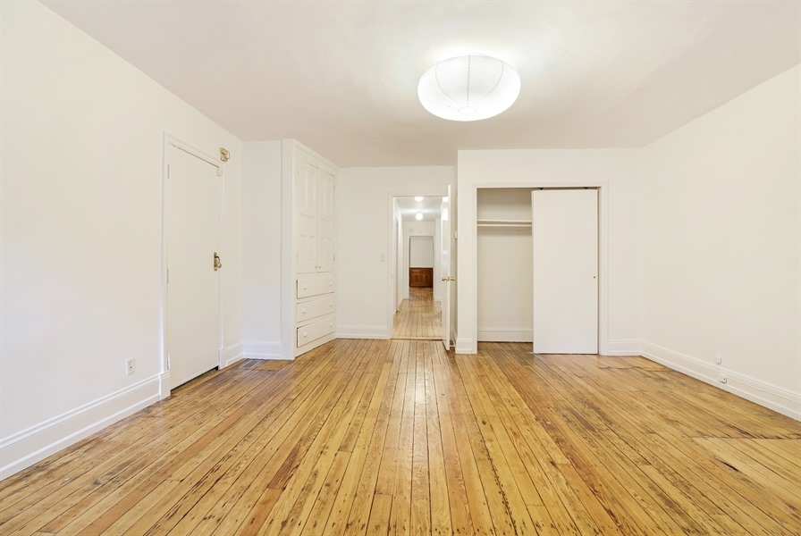 553 2nd Street, Unit 1 Brooklyn, NY 11215 - Photo 7 of 11 a view of an empty room and wooden floor