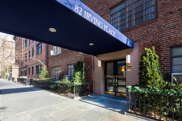 82 Irving Place, Unit 3E Manhattan, NY 10003 - Photo 10 of 15 a building with potted plants in front of it