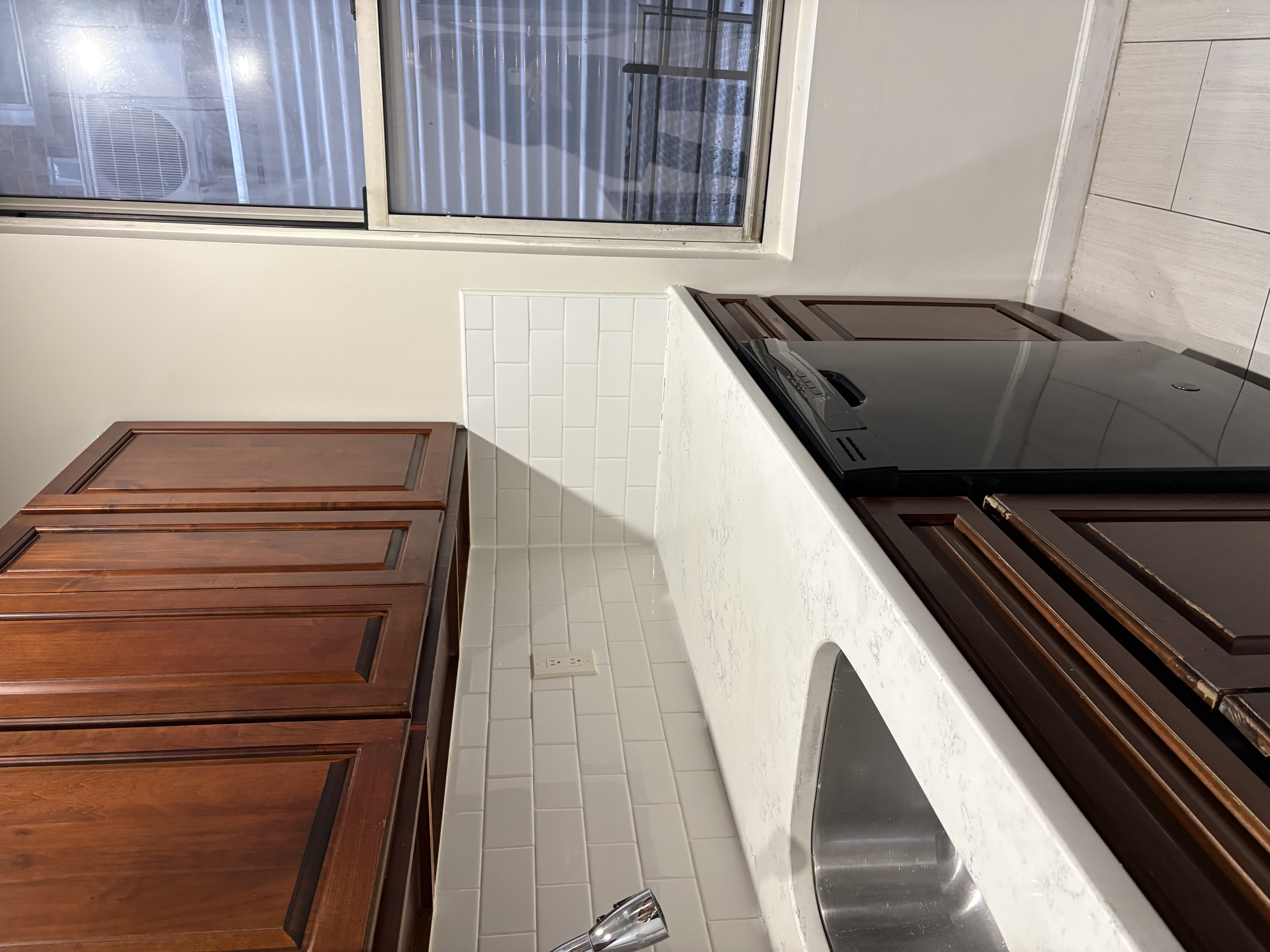 8703 5th Avenue, Unit 2F Brooklyn, NY 11209 - Photo 3 of 9 a kitchen with a sink and cabinets
