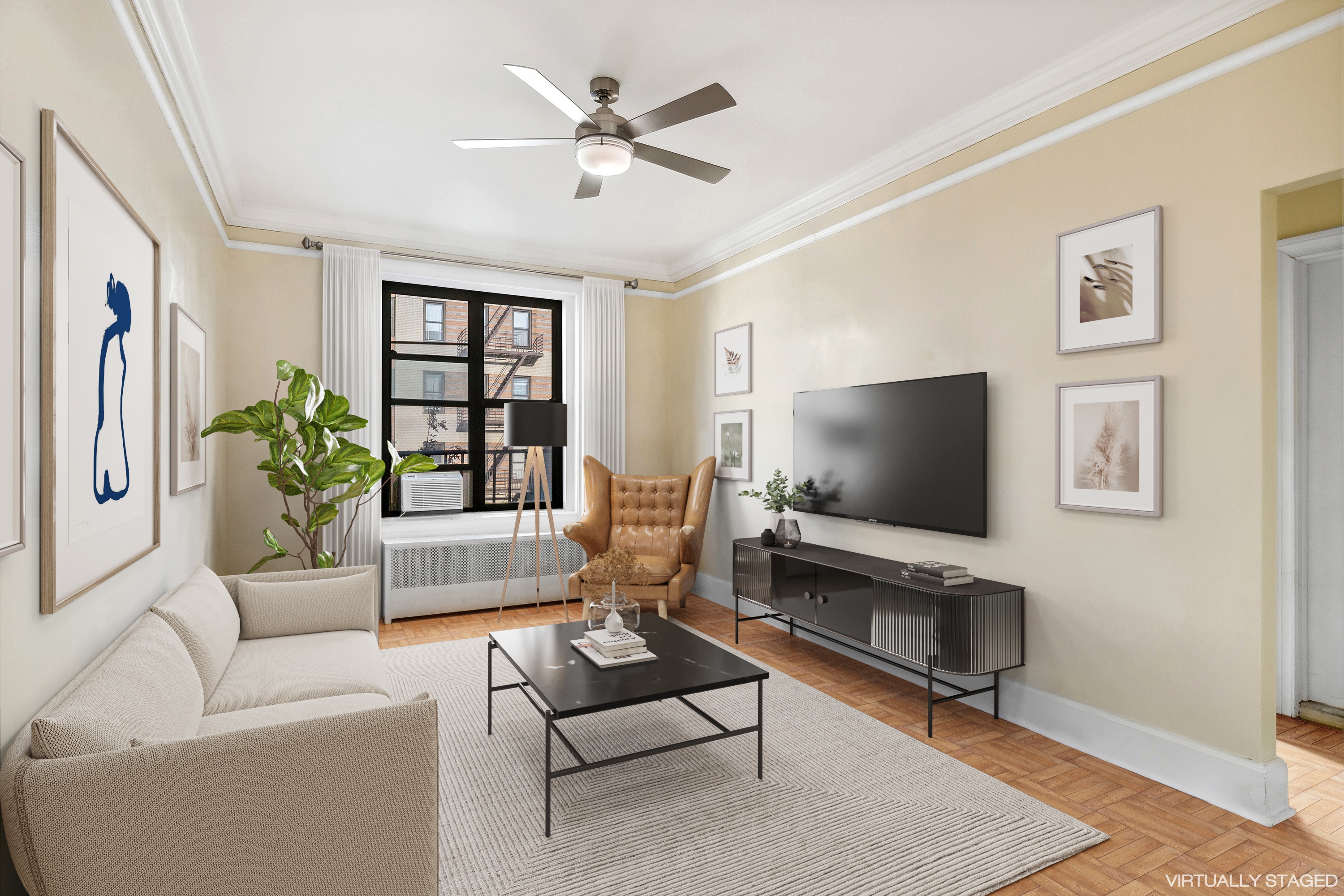 a living room with furniture and a flat screen tv