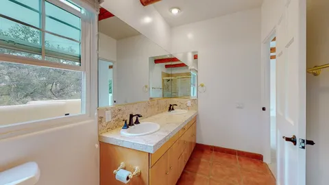 a bathroom with a shower and a bathtub