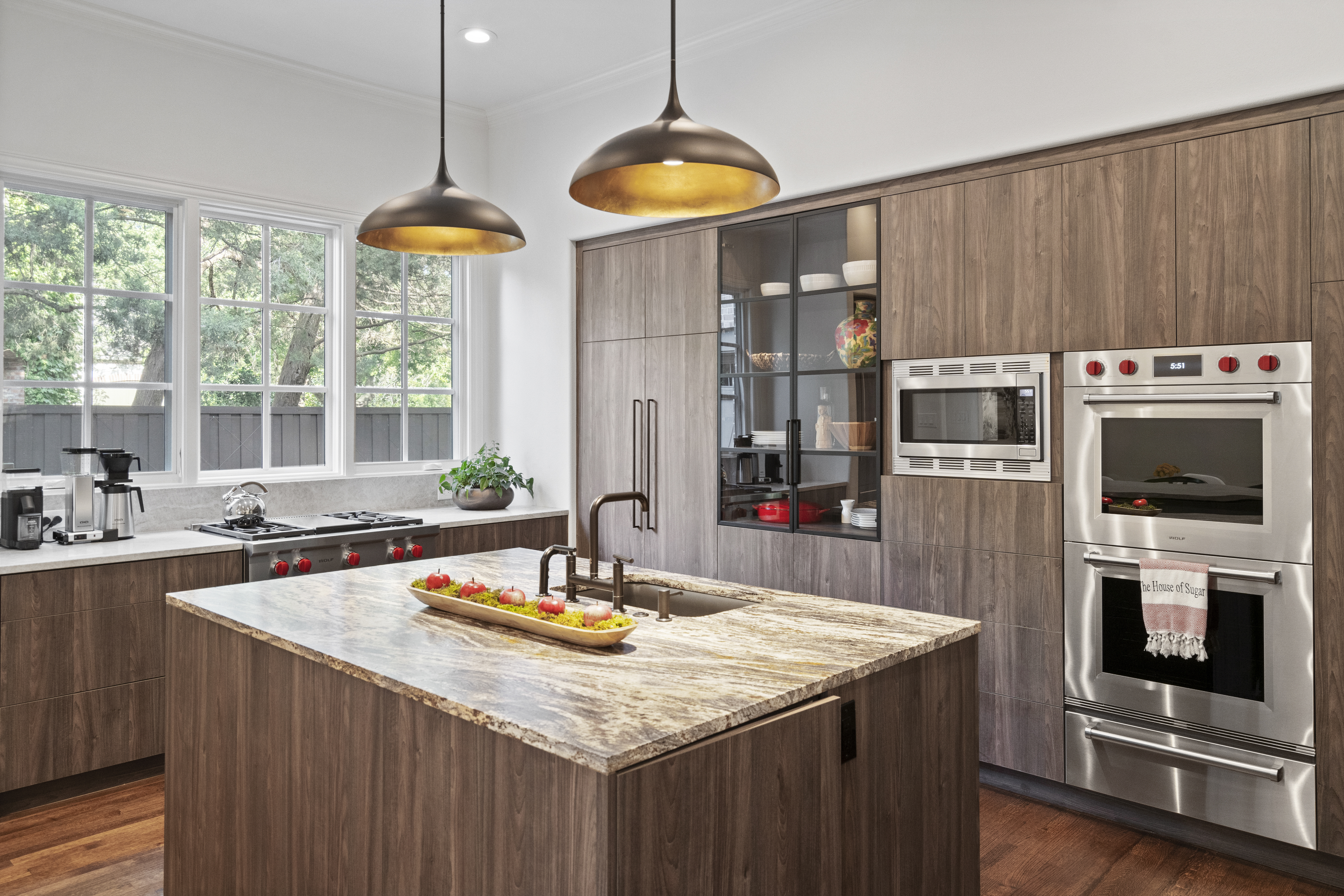 6607 Meadow Road Dallas, TX 75230 - Photo 8 of 32 a kitchen with a counter space a sink and appliances