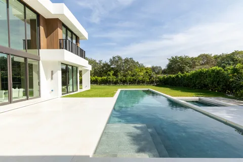 a view of outdoor space yard swimming pool and green space