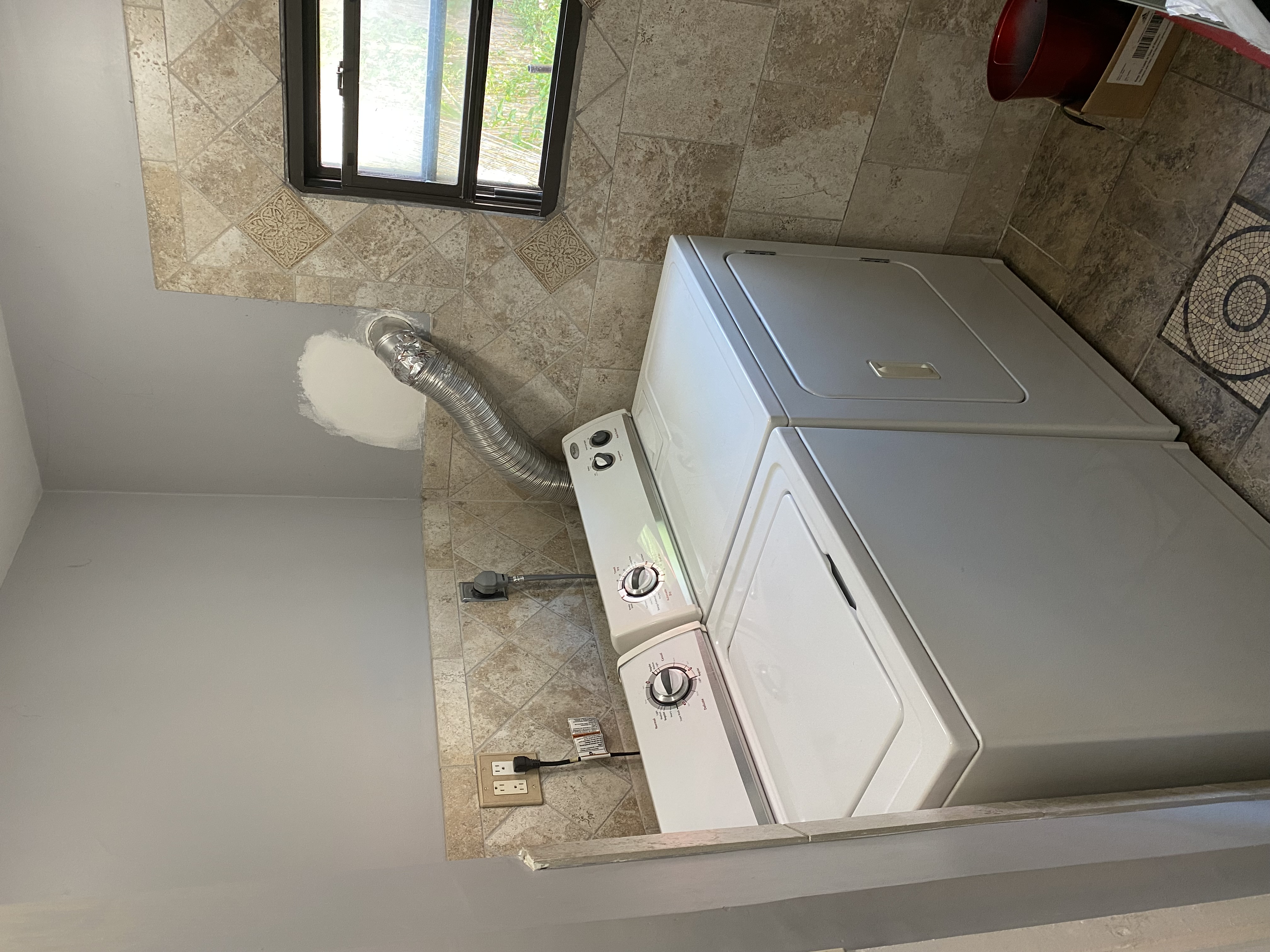 493 Decatur Street, Unit 1 Brooklyn, NY 11233 - Photo 21 of 26 a utility room with dryer and washer