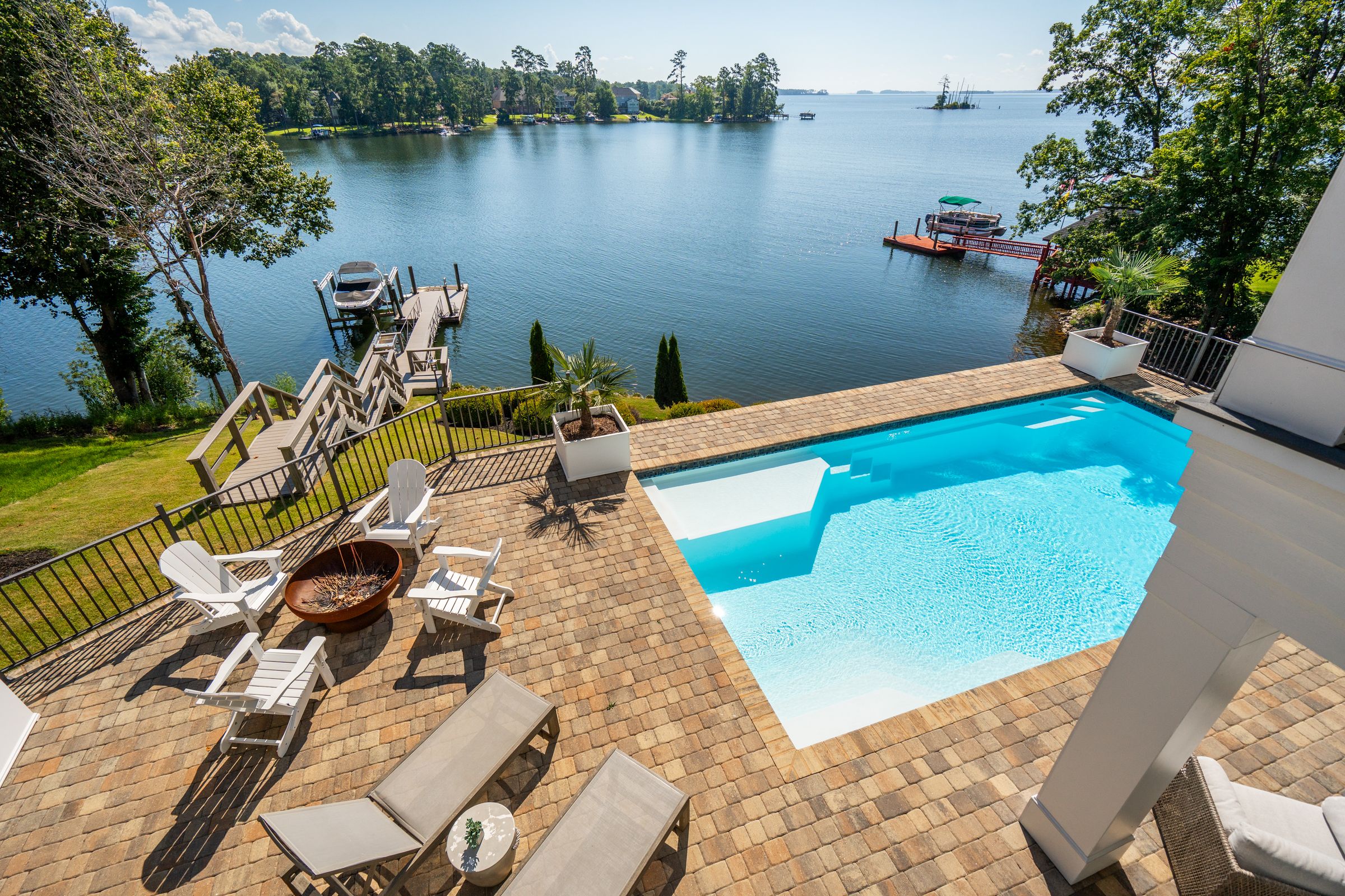 249 Pointe Overlook Drive Chapin, SC 29036 - Photo 47 of 56 swimming pool with lounge chair