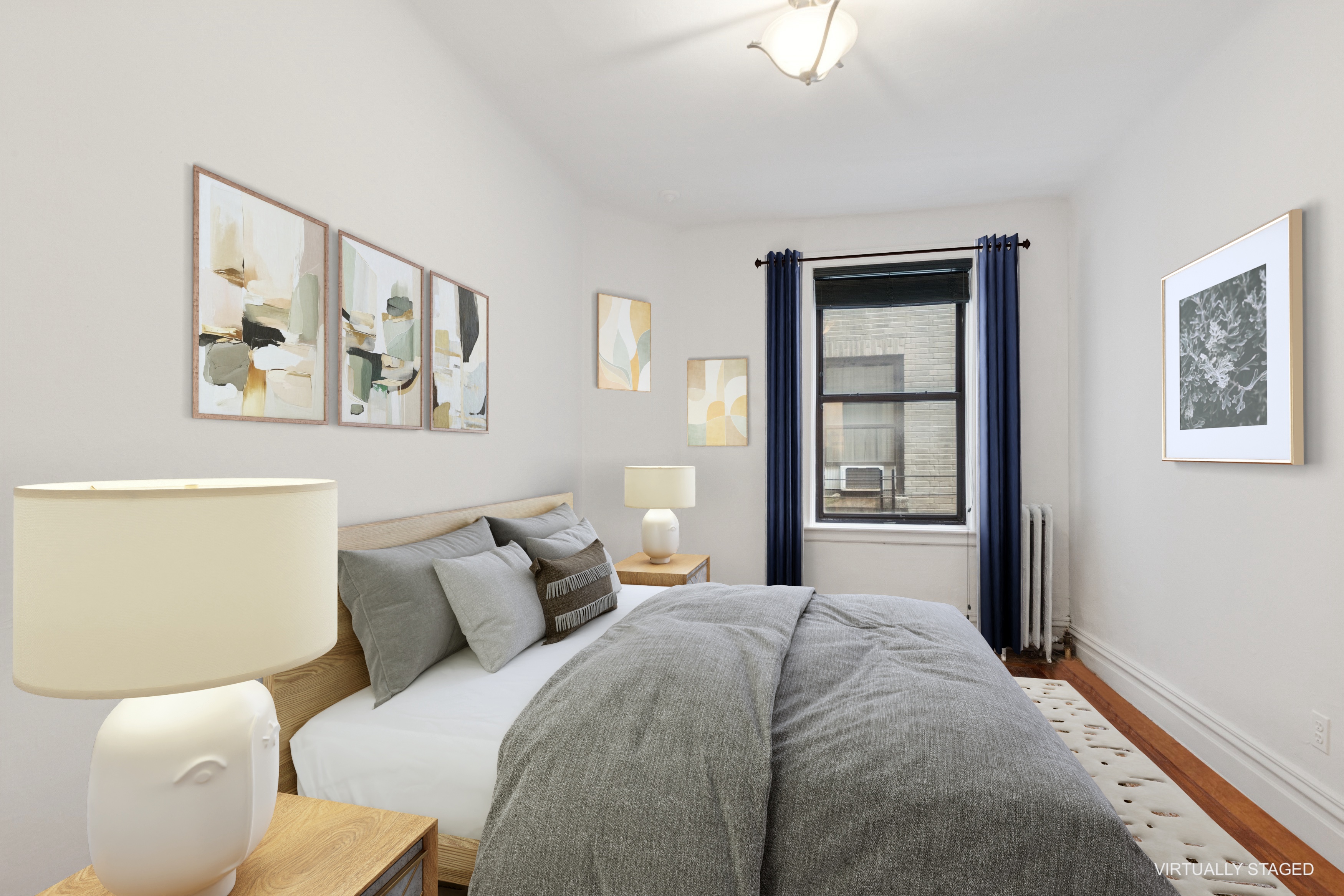 804 West 180th Street, Unit 41 Manhattan, NY 10033 - Photo 12 of 23 a bedroom with a bed and a painting on the wall