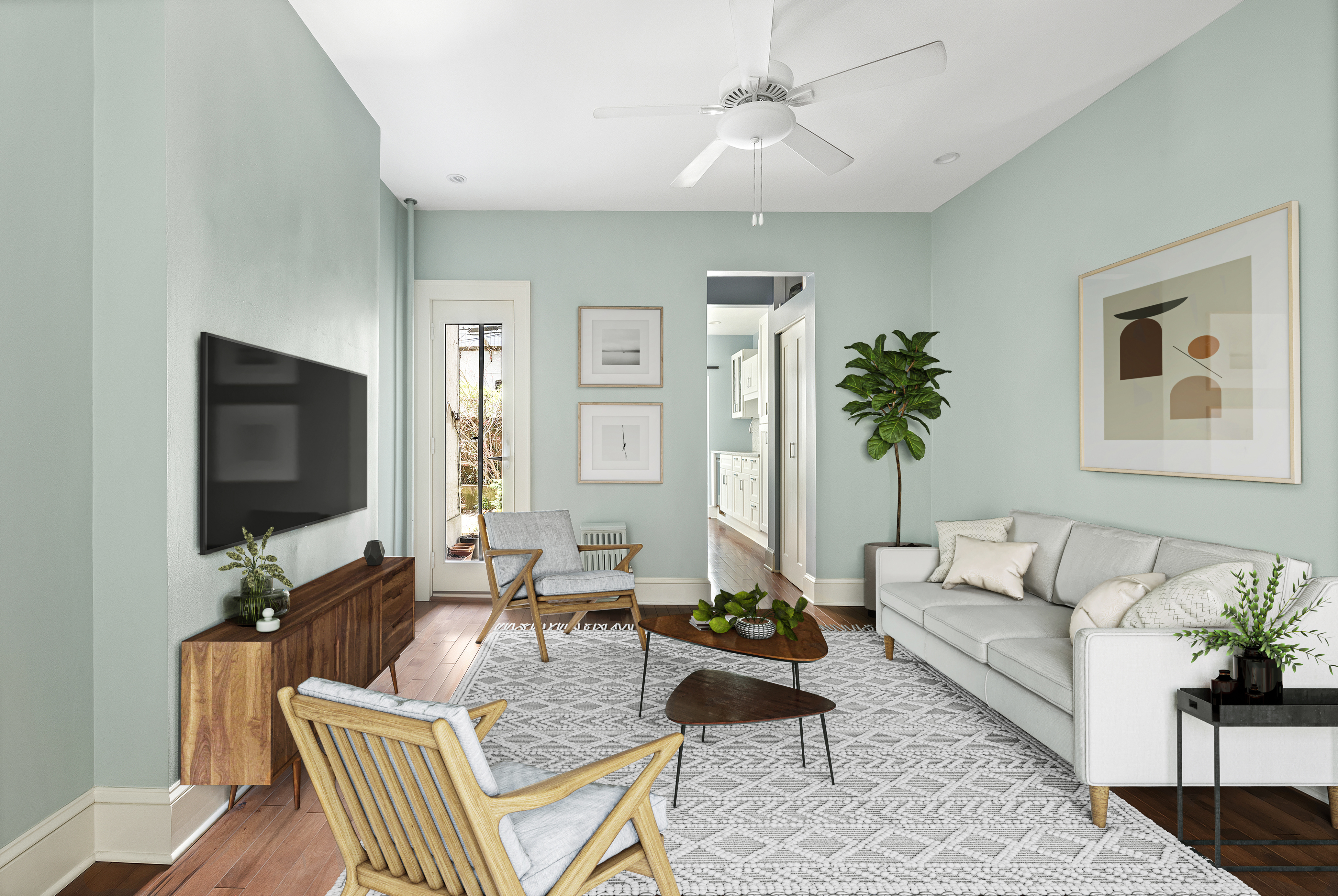 a living room with furniture and a flat screen tv