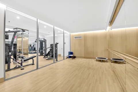 a view of a room with gym equipment