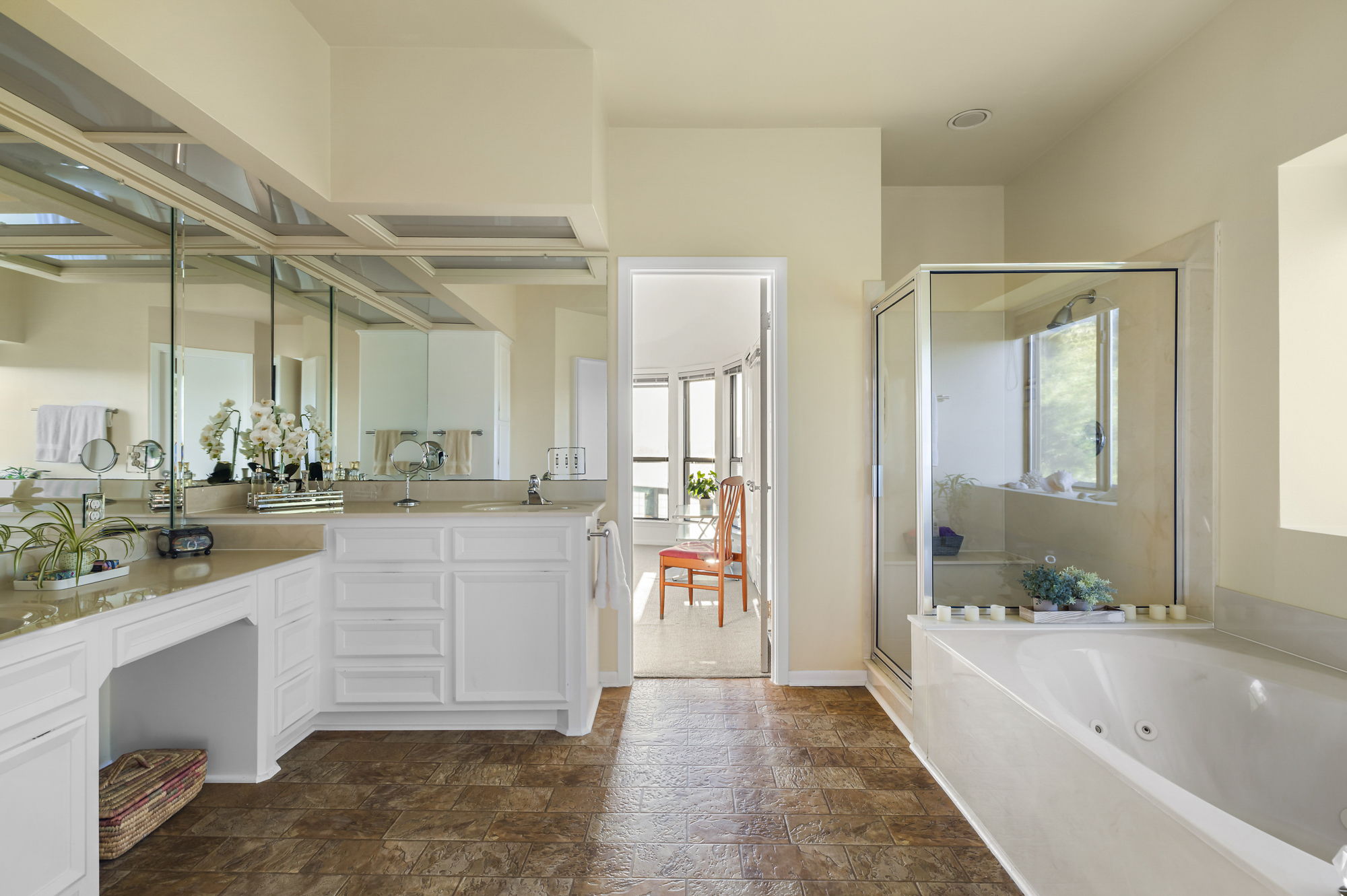 1605 The High Road Austin, TX 78746 - Photo 25 of 45 a bathroom with a tub sink and mirror