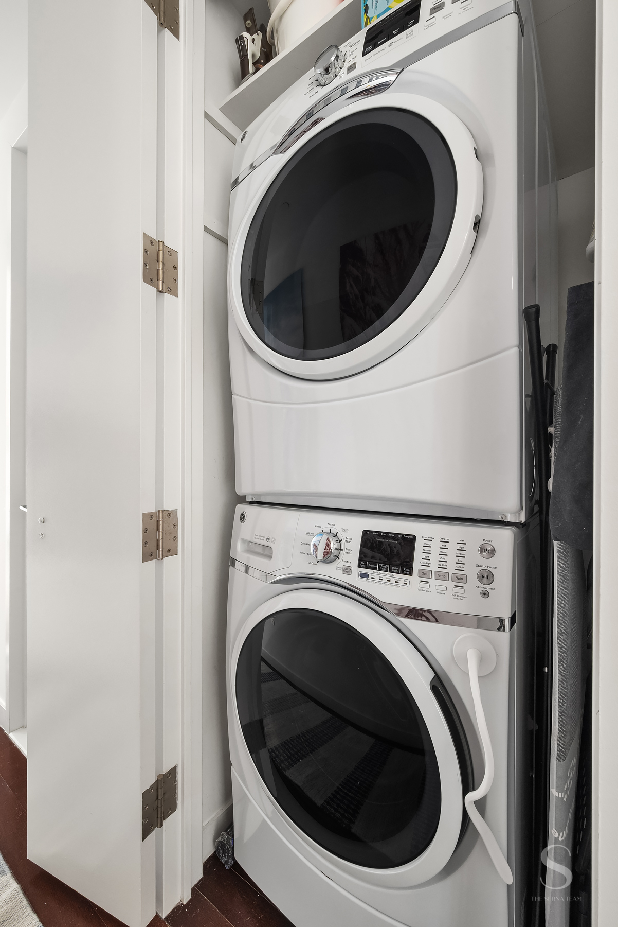 4 West 21st Street, Unit 14A Manhattan, NY 10010 - Photo 11 of 16 a utility room with dryer and washer