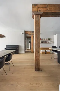 a room with furniture and a piano