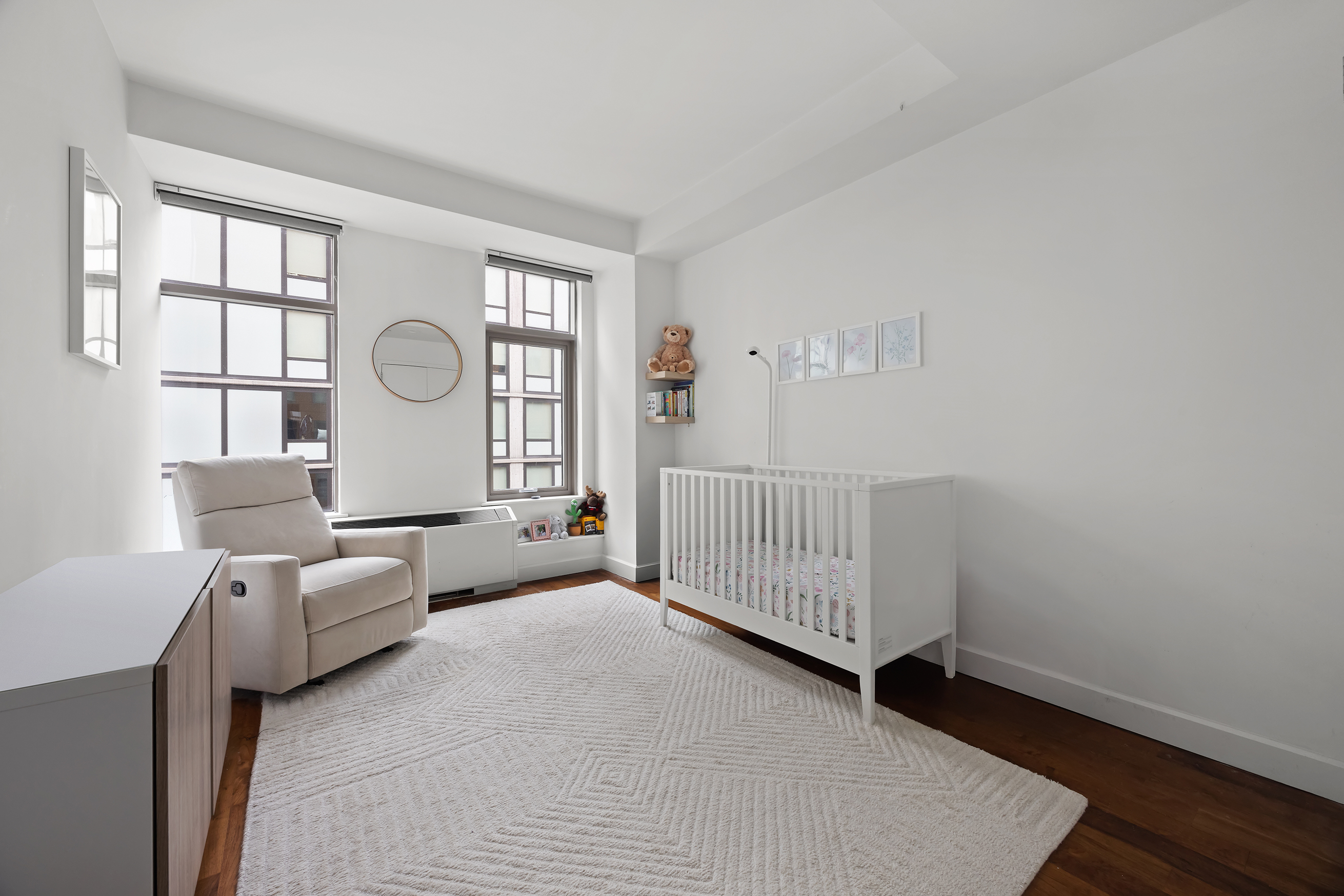 2-17 51st Avenue, Unit 913 Queens, NY 11101 - Photo 7 of 17 a living room with furniture and a window