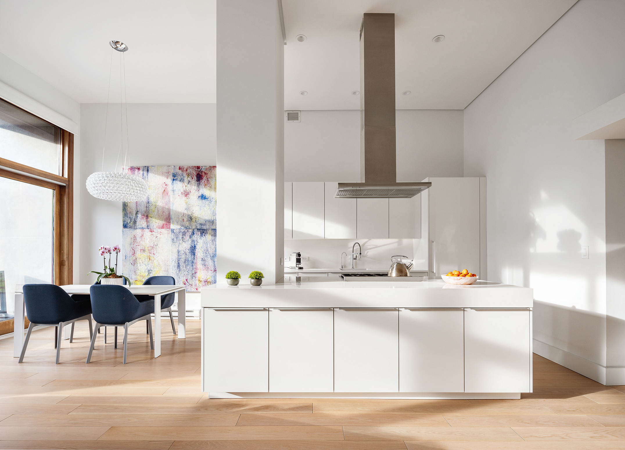1080 Madison Avenue, Unit 6B Manhattan, NY 10028 - Photo 2 of 11 a kitchen with stainless steel appliances kitchen island granite countertop a sink and a stove