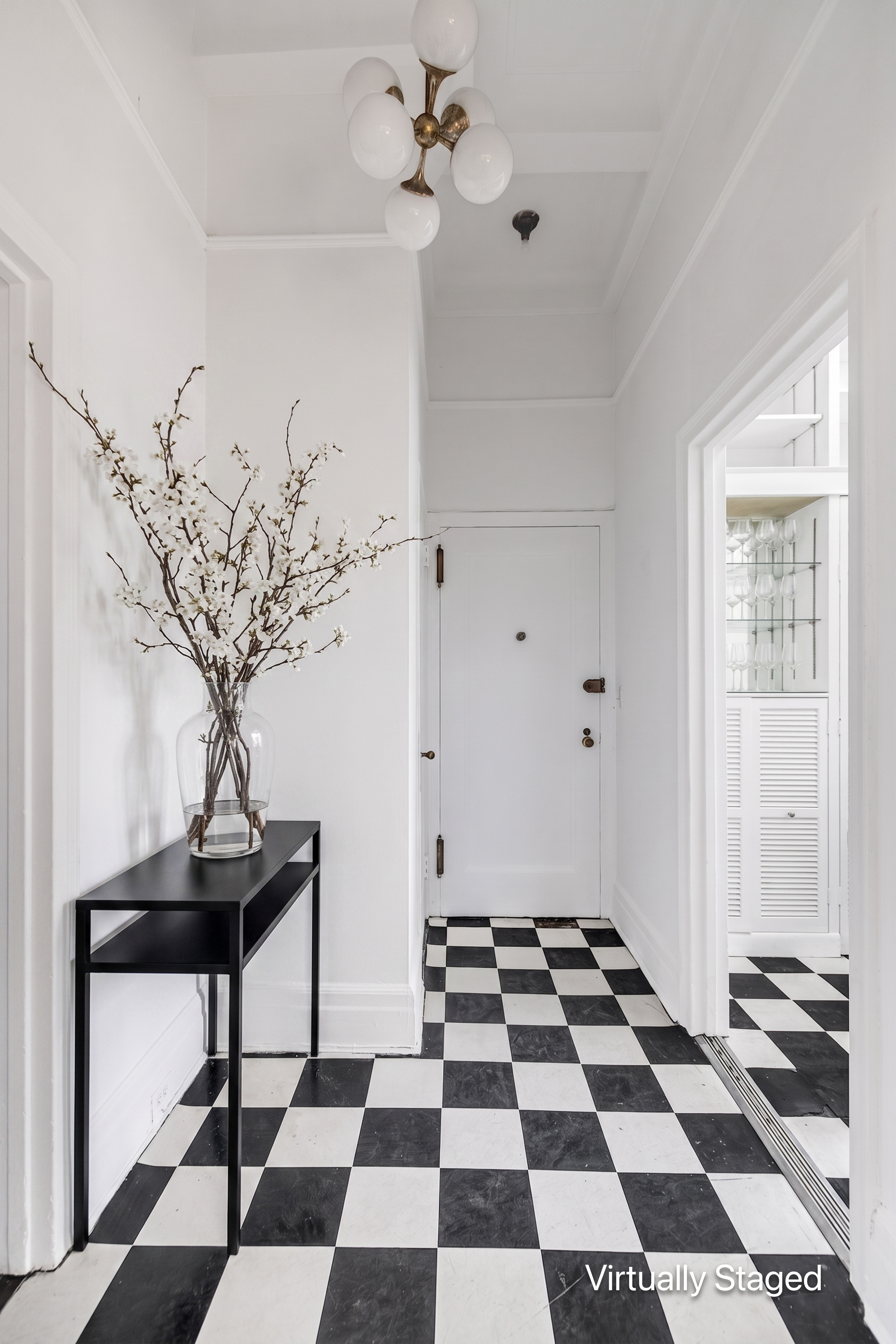 470 West End Avenue, Unit PH-G New York, NY 10024 - Photo 12 of 22 a room with a black white checkered floor with a black white checkered floor and a potted plant