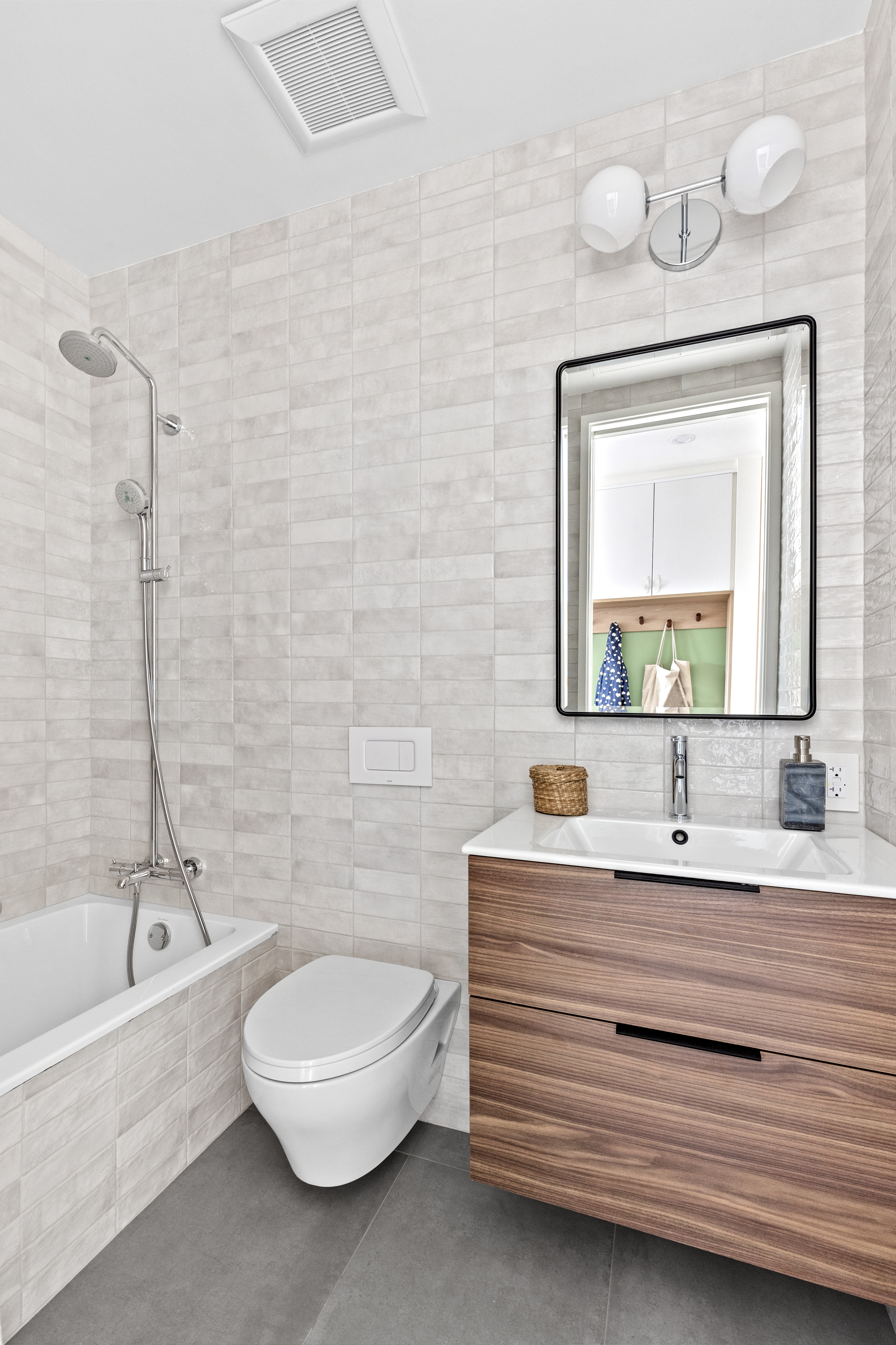 489 7th Avenue, Unit 3 Brooklyn, NY 11215 - Photo 8 of 11 a bathroom with a sink a toilet and a bathtub
