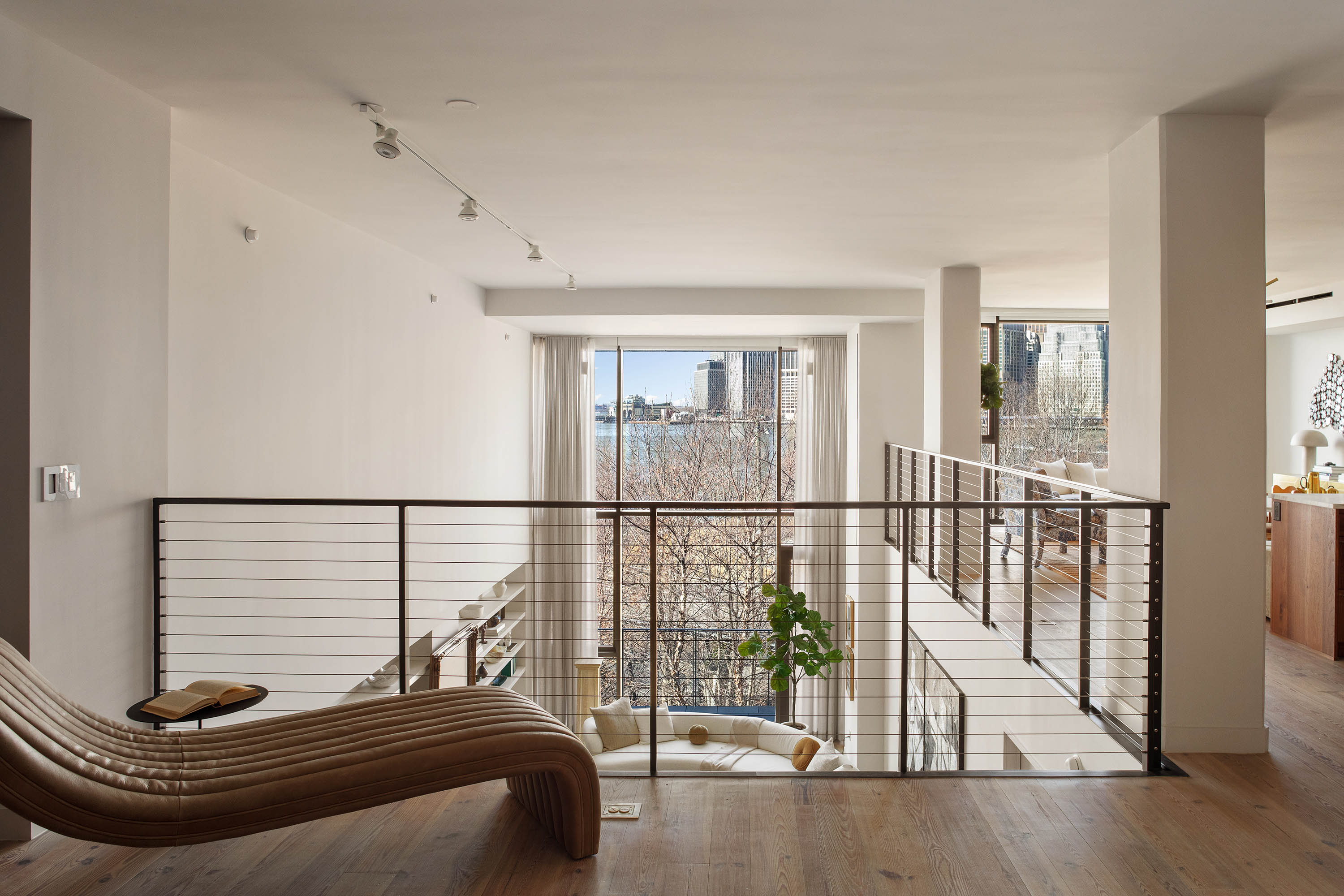 90 Furman Street, Unit N411 Brooklyn, NY 11201 - Photo 2 of 29 a bedroom with a bed and a window