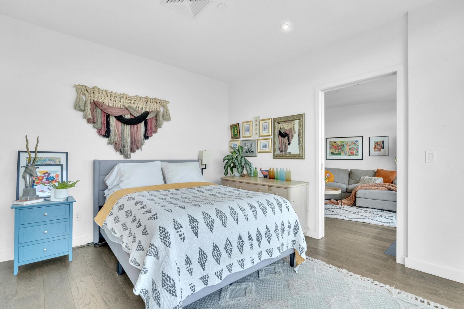 179 Woodpoint Road, Unit 4A Brooklyn, NY 11211 - Photo 9 of 16 a bedroom with a bed and dresser