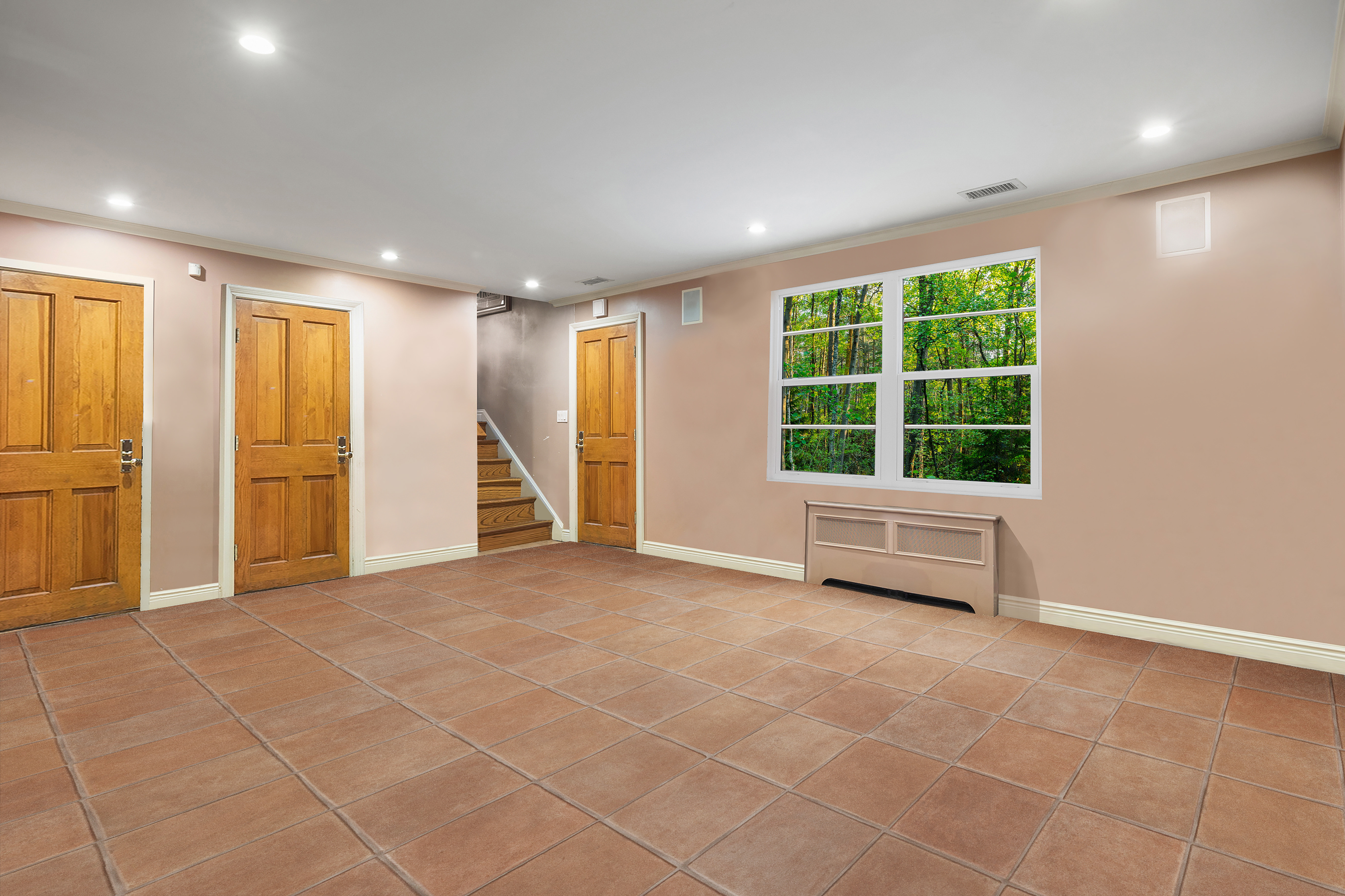 110 82nd Street Brooklyn, NY 11209 - Photo 16 of 28 a view of an empty room with a window