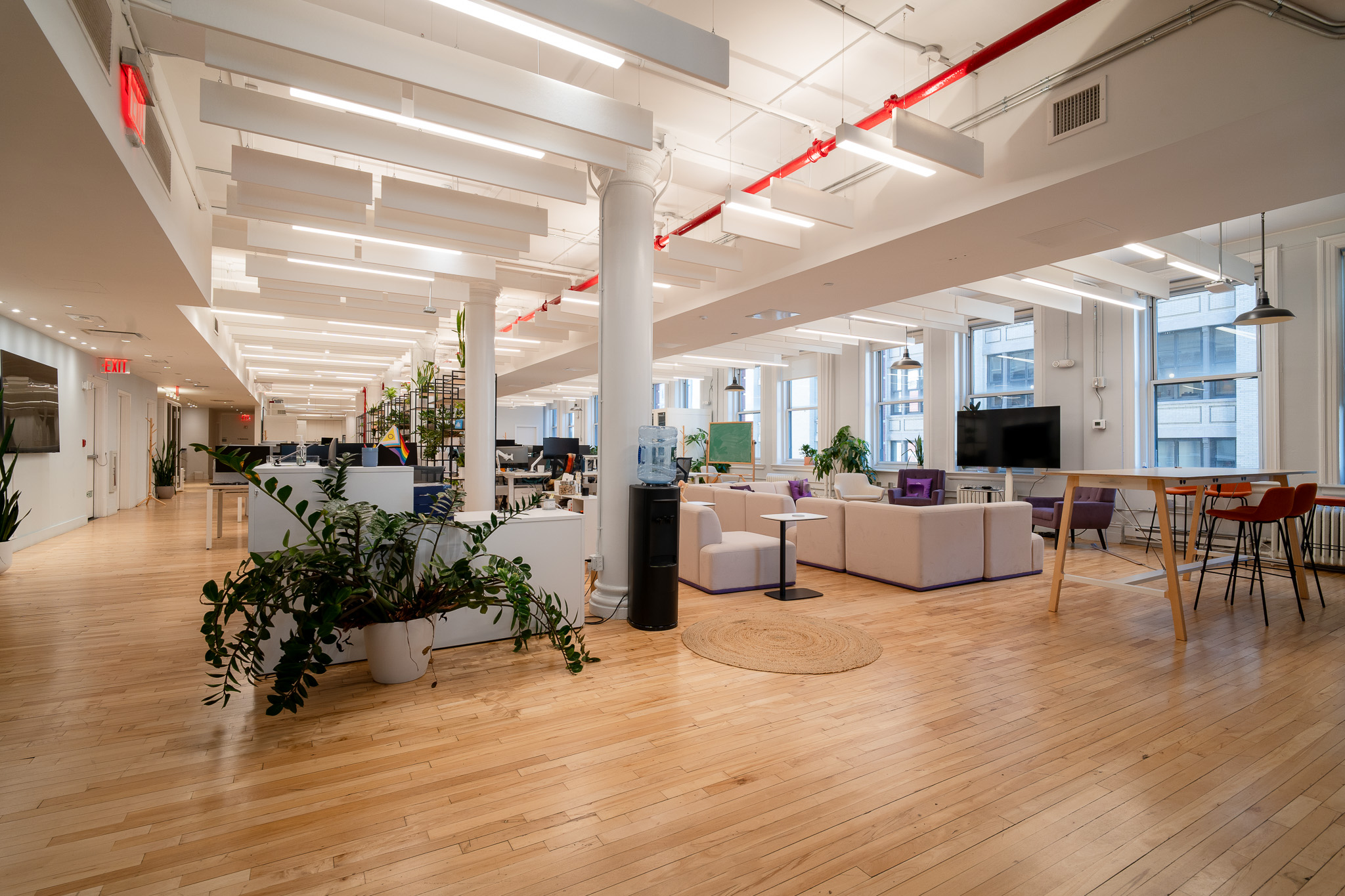 85 5th Avenue, Unit 8 Manhattan, NY 10003 - Photo 6 of 12 a living room with furniture and a wooden floor