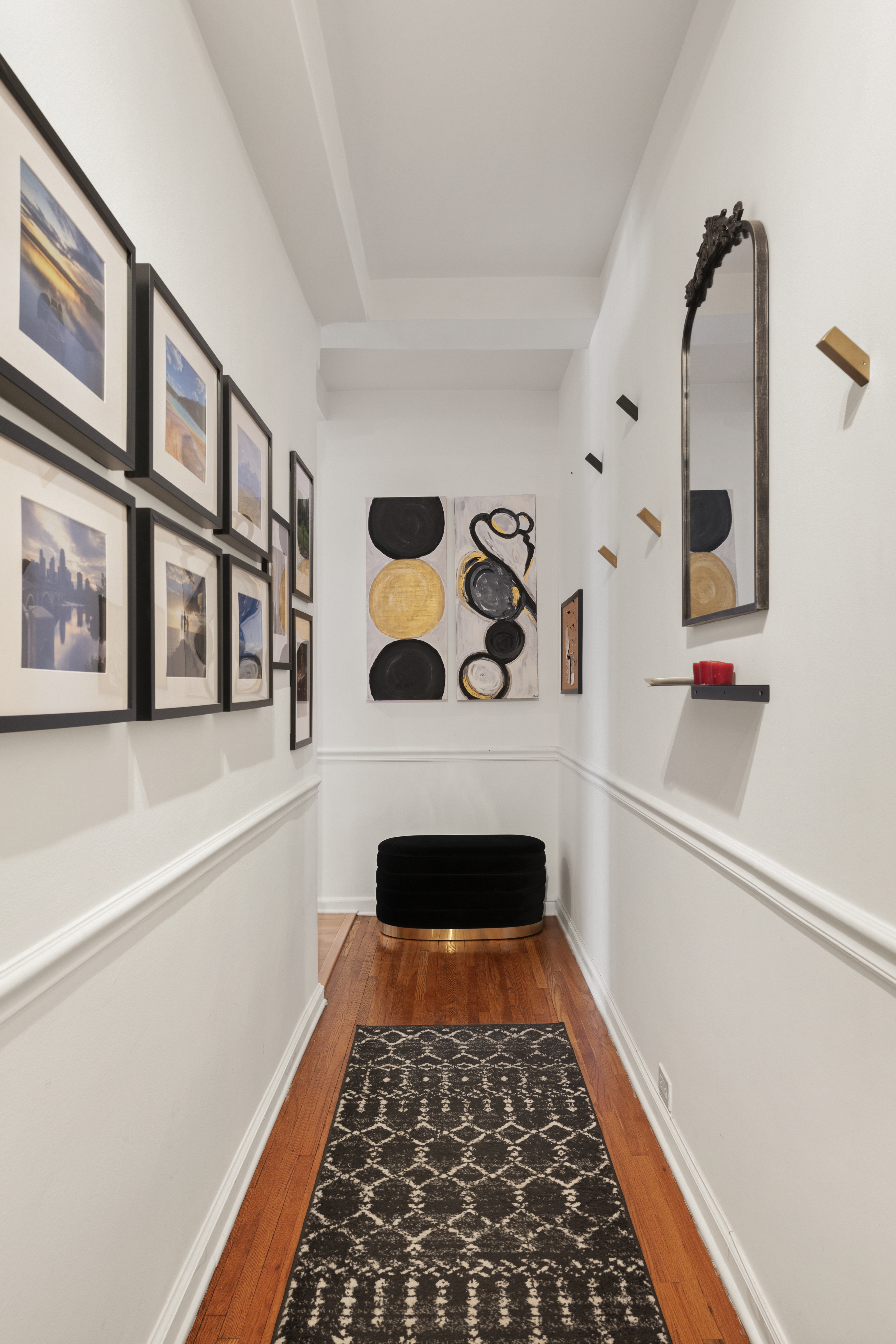 339 East 58th Street, Unit 9F Manhattan, NY 10022 - Photo 3 of 9 a walk in closet with wooden floor