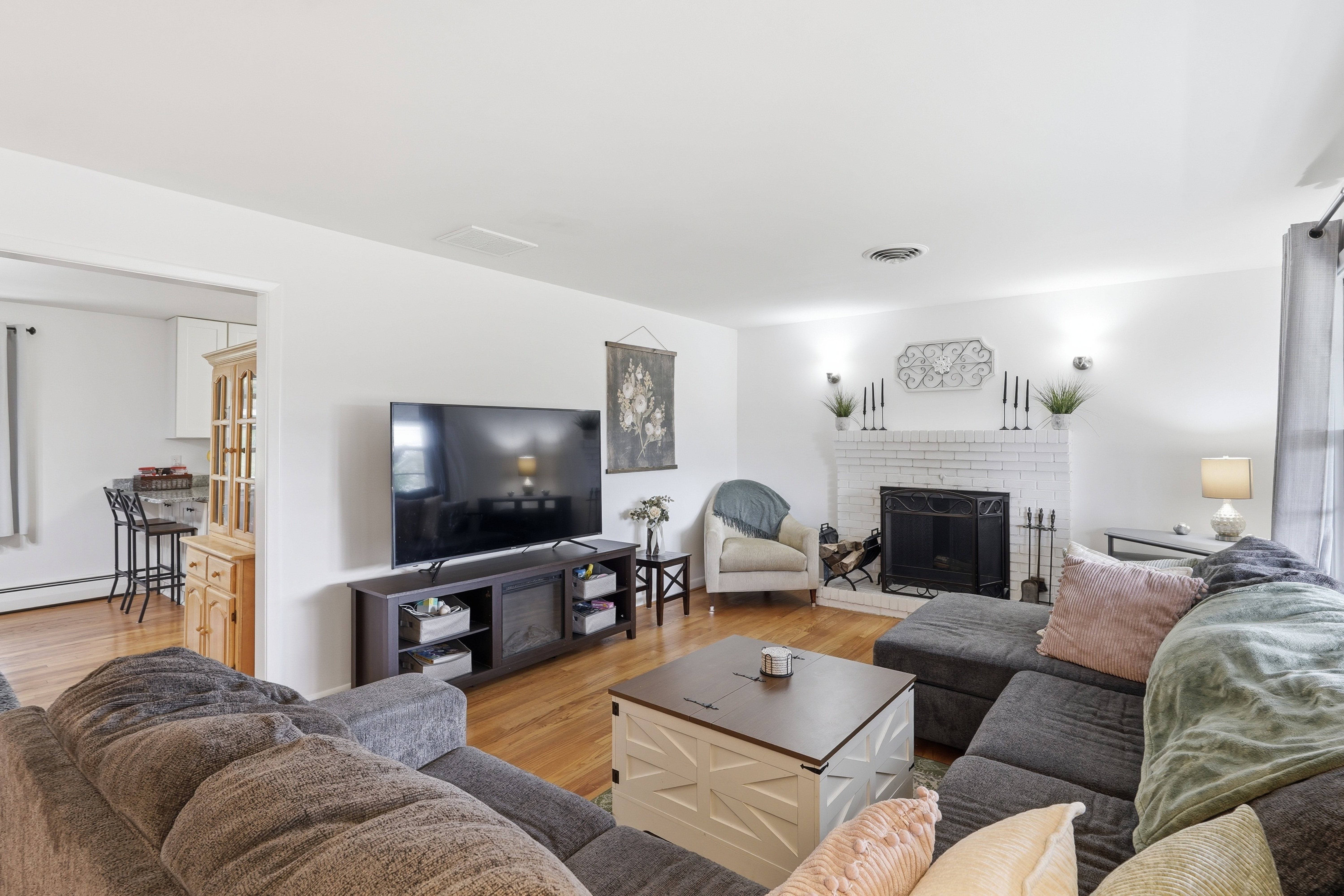 7717 McKaig Road Frederick, MD 21701 - Photo 9 of 53 a living room with furniture and a flat screen tv
