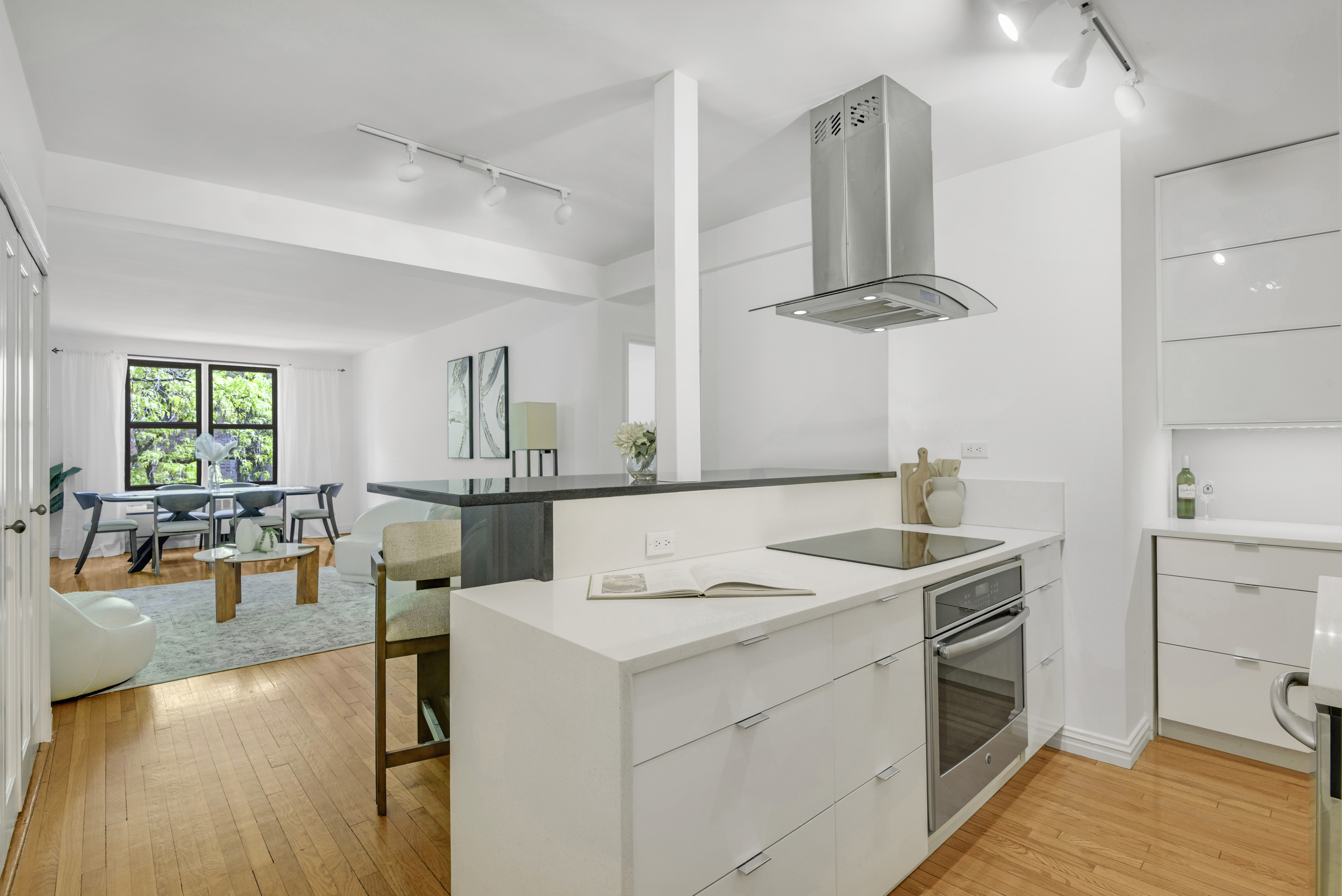 330 East 70th Street, Unit 4F Manhattan, NY 10021 - Photo 1 of 14 a view of living room with granite countertop furniture and fireplace
