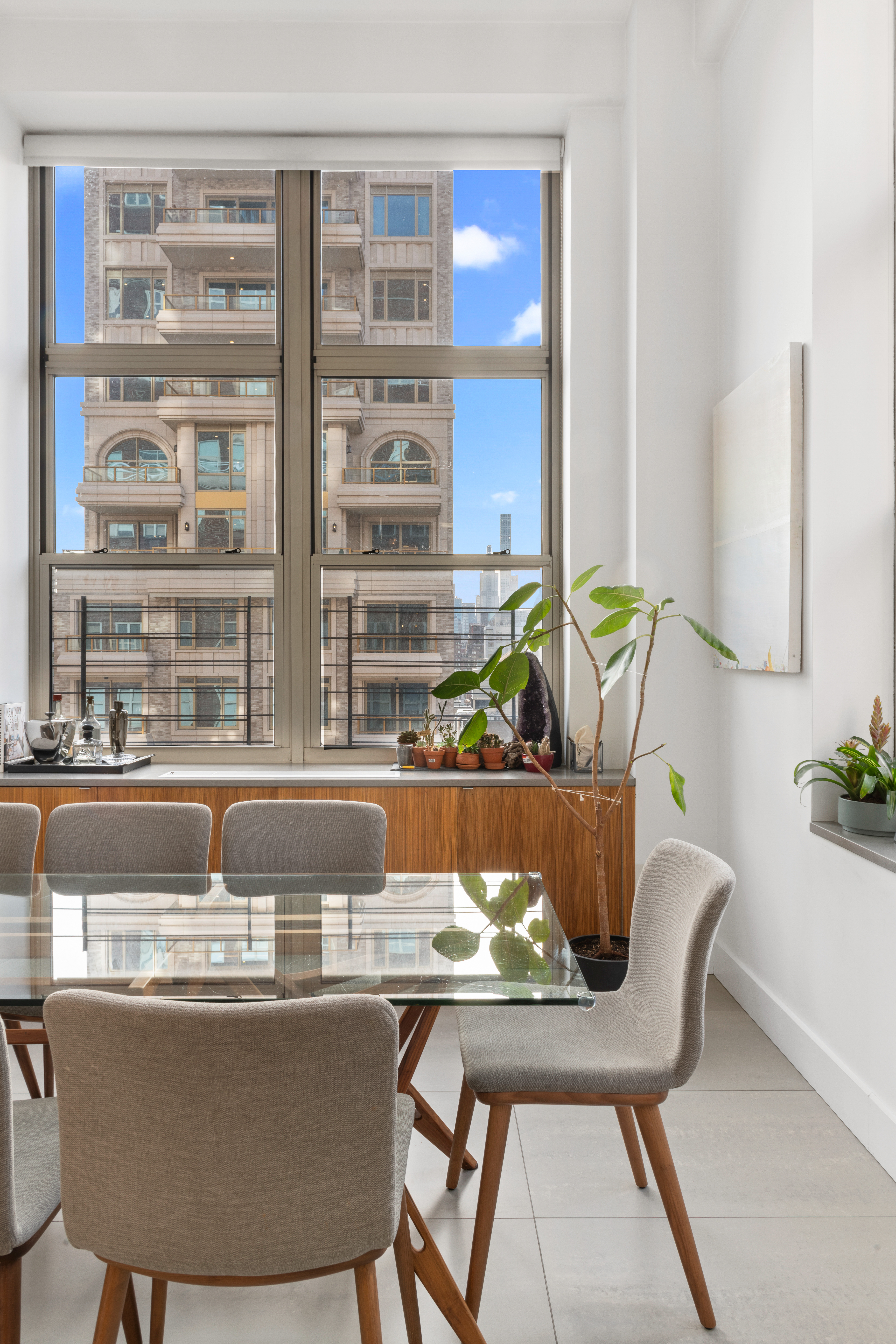 120 East 87th Street, Unit R16G Manhattan, NY 10128 - Photo 3 of 20 a view of a dining room with furniture and window