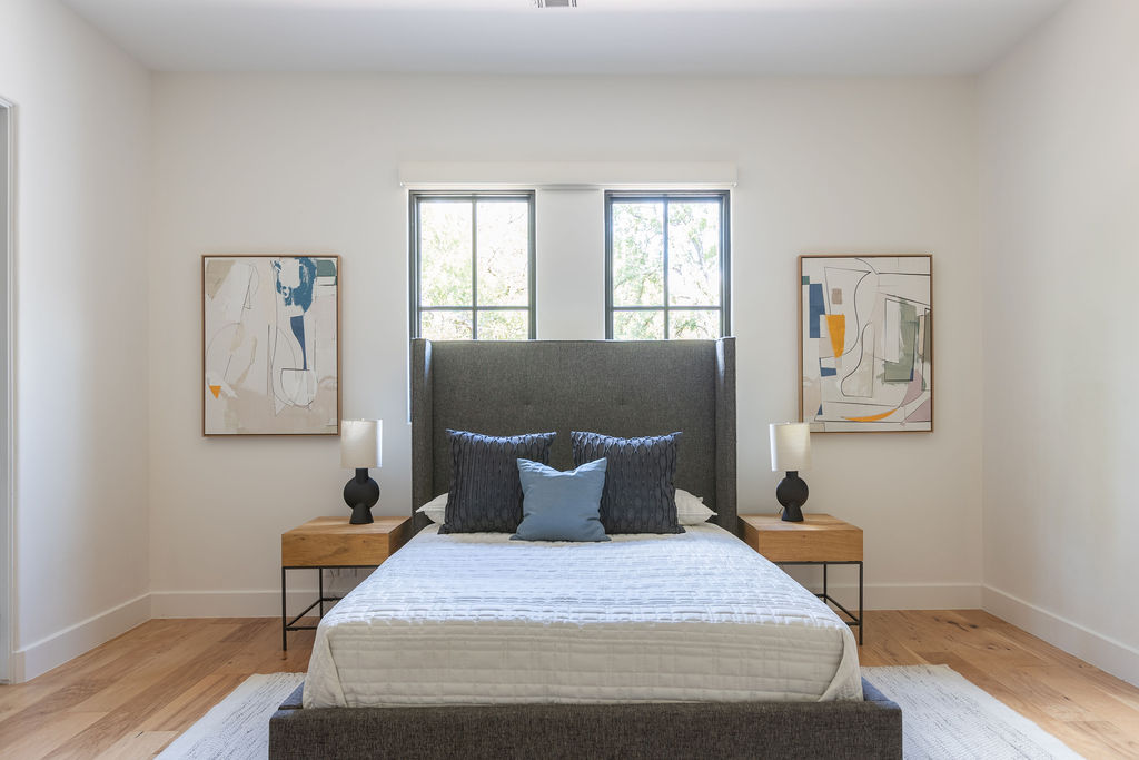 400 Inwood Road Austin, TX 78746 - Photo 37 of 43 a bedroom with a bed and window