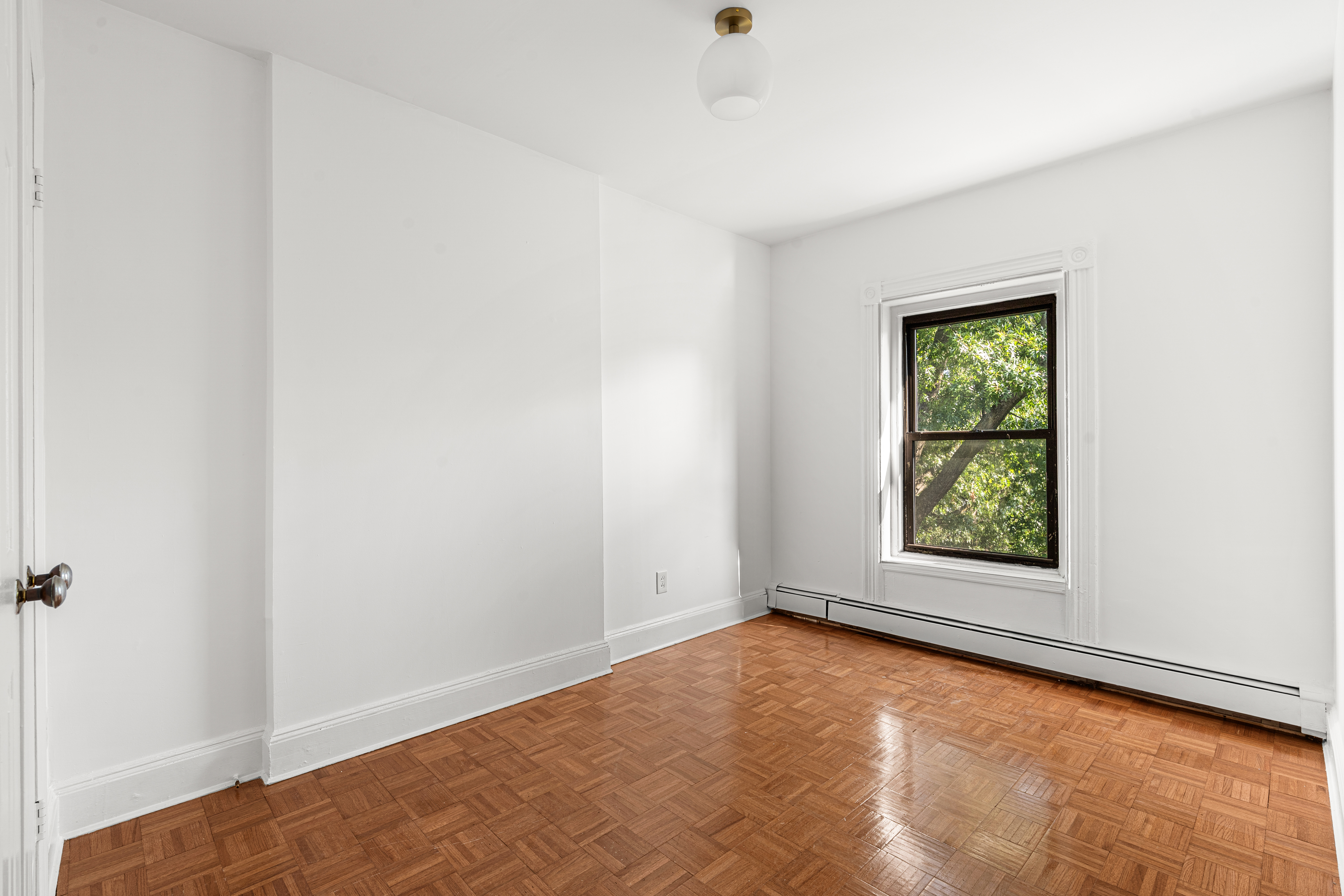 306 Lafayette Avenue, Unit 4 Brooklyn, NY 11238 - Photo 6 of 11 an empty room with a window