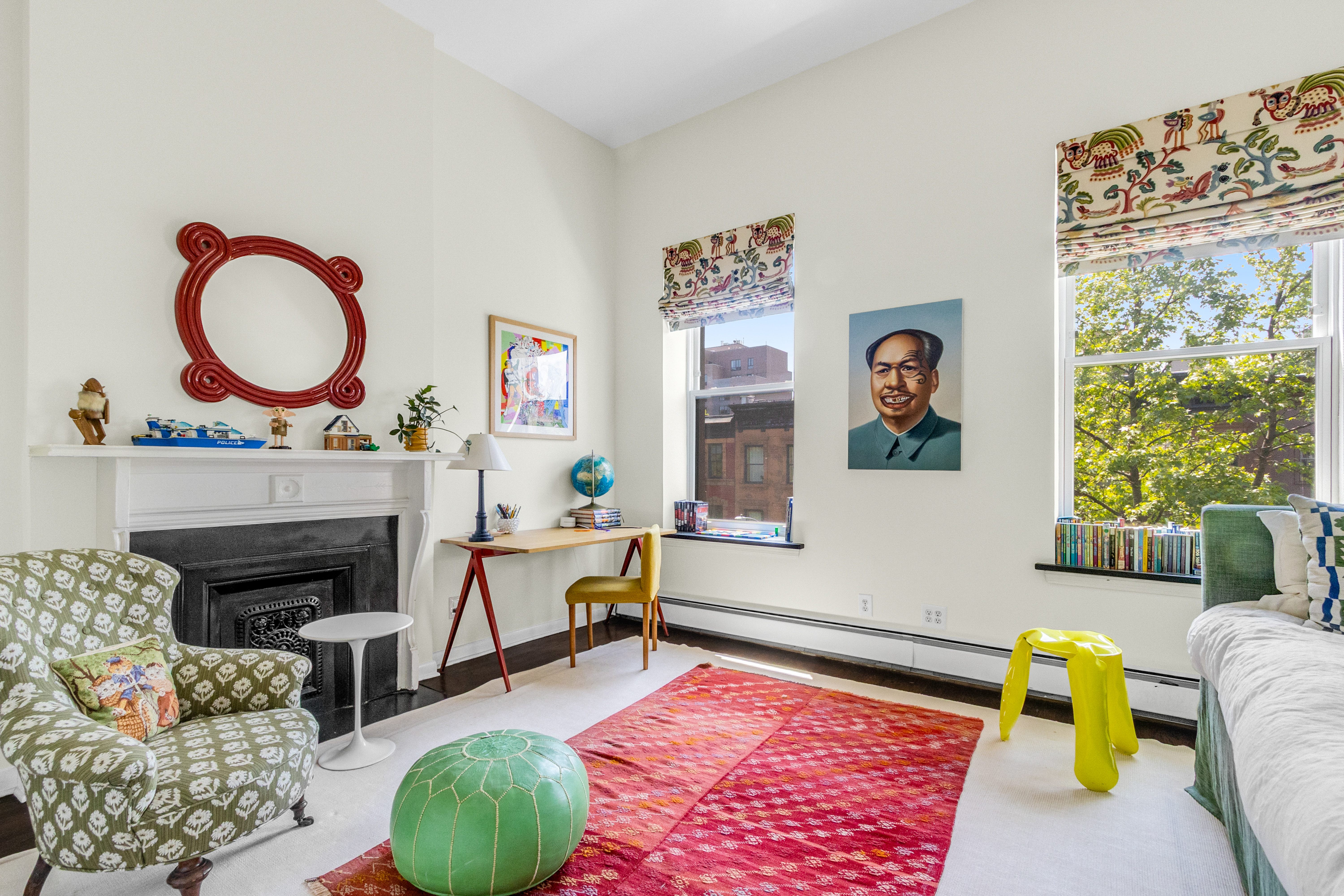 125 West 132nd Street Manhattan, NY 10027 - Photo 12 of 21 a living room with furniture and a fireplace