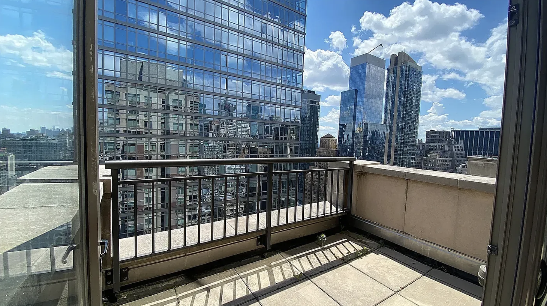 35 West 33rd Street, Unit 32C Manhattan, NY 10001 - Photo 9 of 21 a view of a balcony with city view
