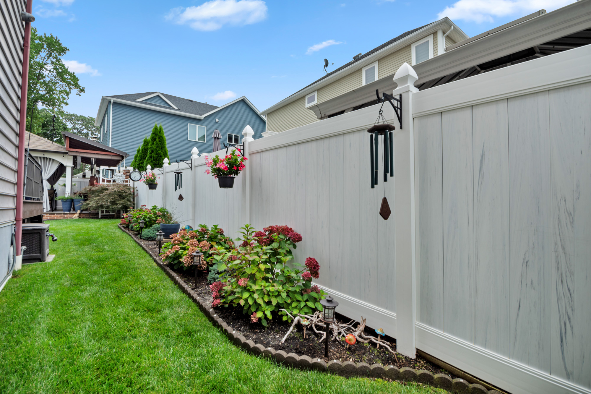 909 Jewett Avenue Staten Island, NY 10314 - Photo 50 of 65 a front view of a house with a yard