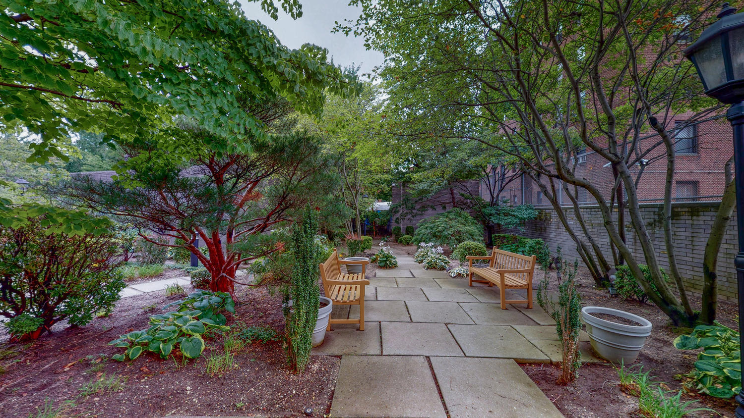 112-01 Queens Boulevard, Unit 8A Queens, NY 11375 - Photo 11 of 19 a view of a backyard with sitting area