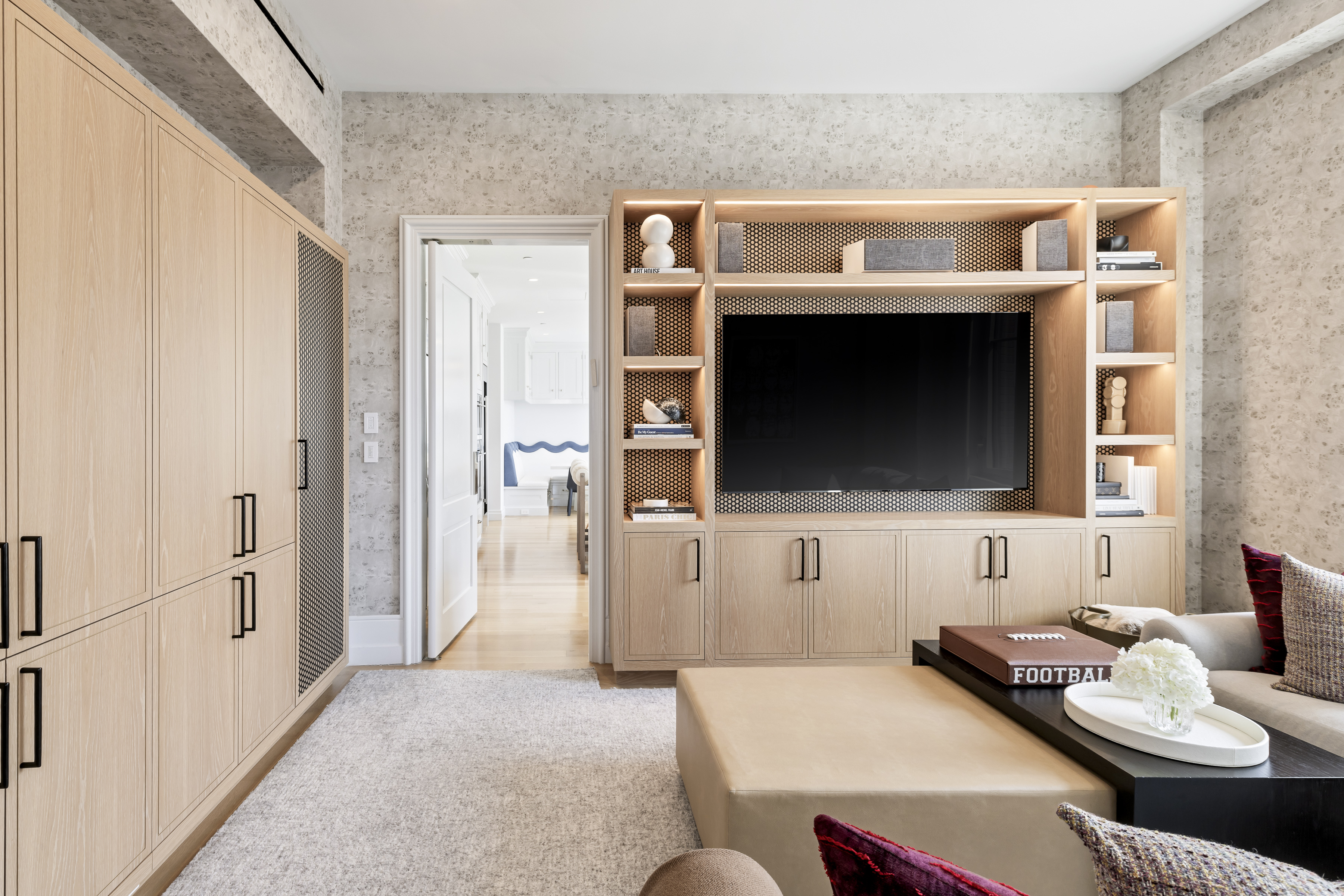 301 East 80th Street, Unit 25B Manhattan, NY 10075 - Photo 6 of 38 a living room with furniture and a flat screen tv