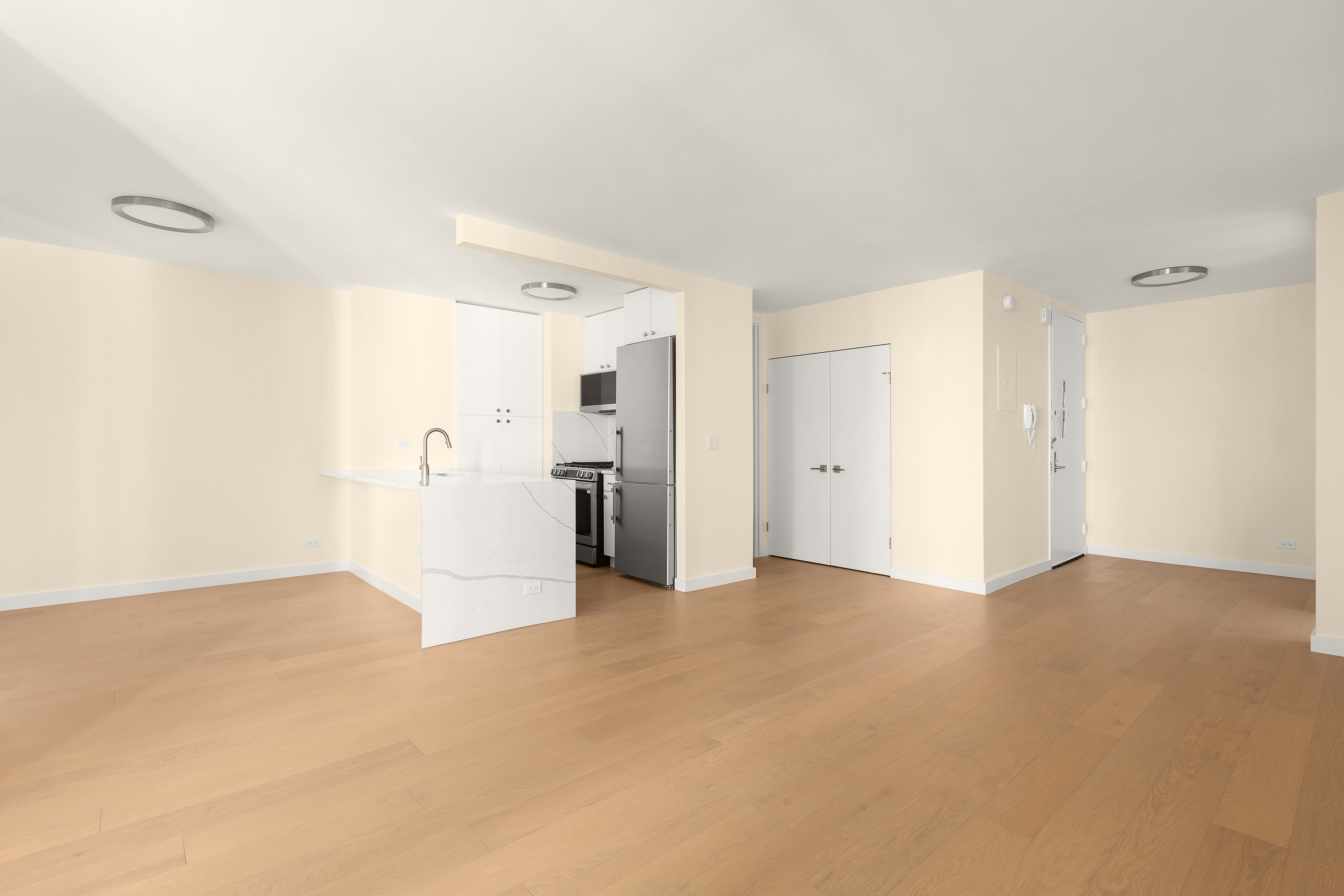 161 West 61st Street, Unit 5C Manhattan, NY 10023 - Photo 12 of 30 a view of a big room with closet and windows