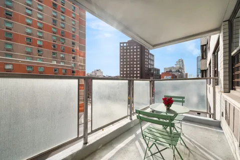 a view of a livingroom with furniture and window