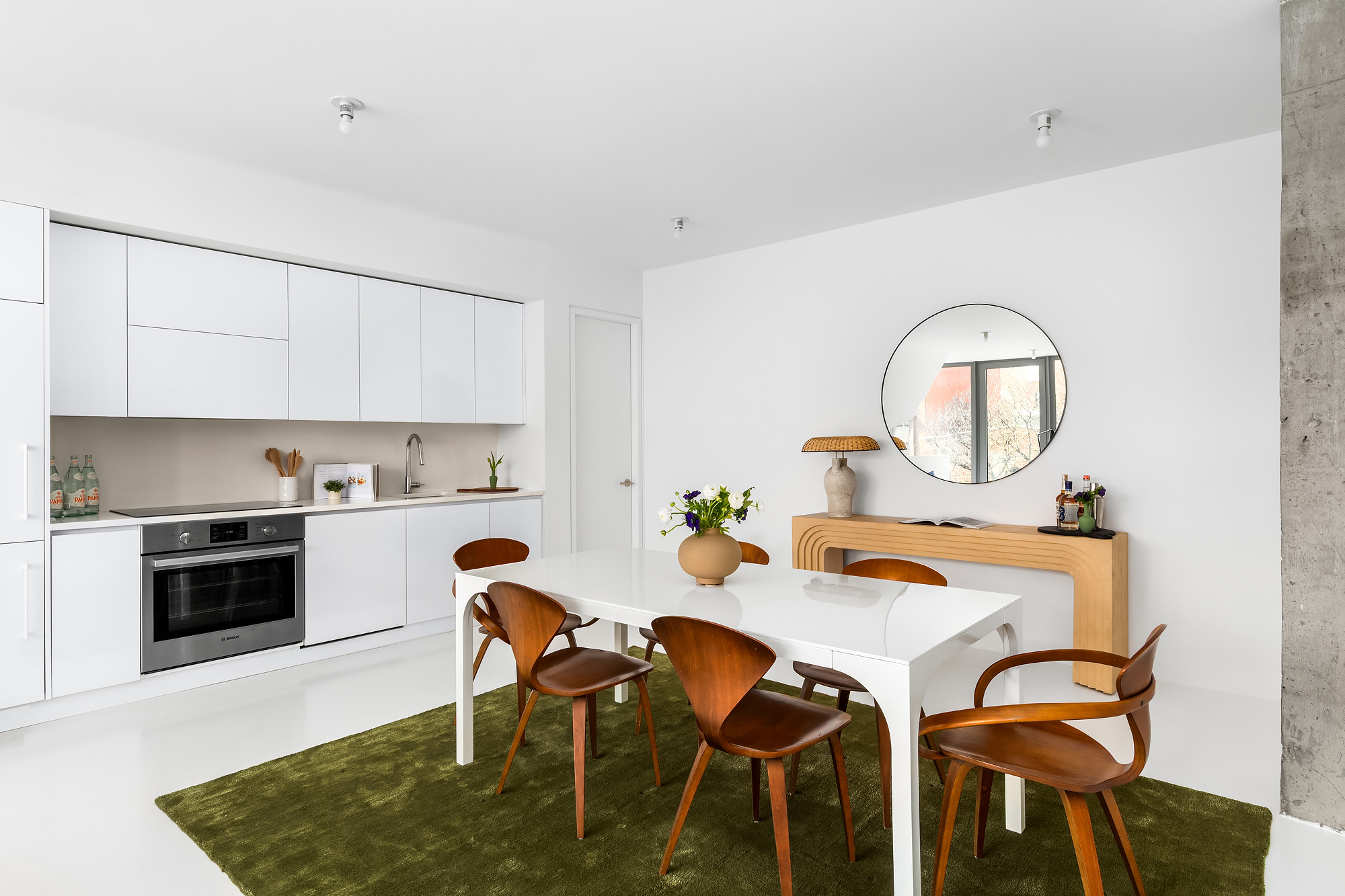 272 Greene Avenue Brooklyn, NY 11238 - Photo 3 of 19 a view of a dining room with furniture and a kitchen