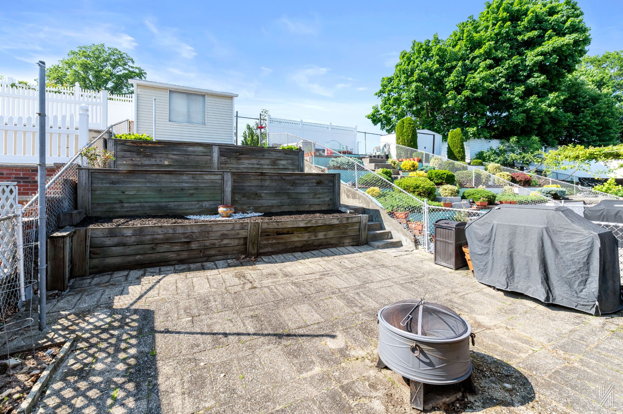 67-17 Eliot Avenue Queens, NY 11379 - Photo 18 of 21 a view of a backyard with sitting area