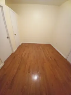 an empty room with a empty space and window