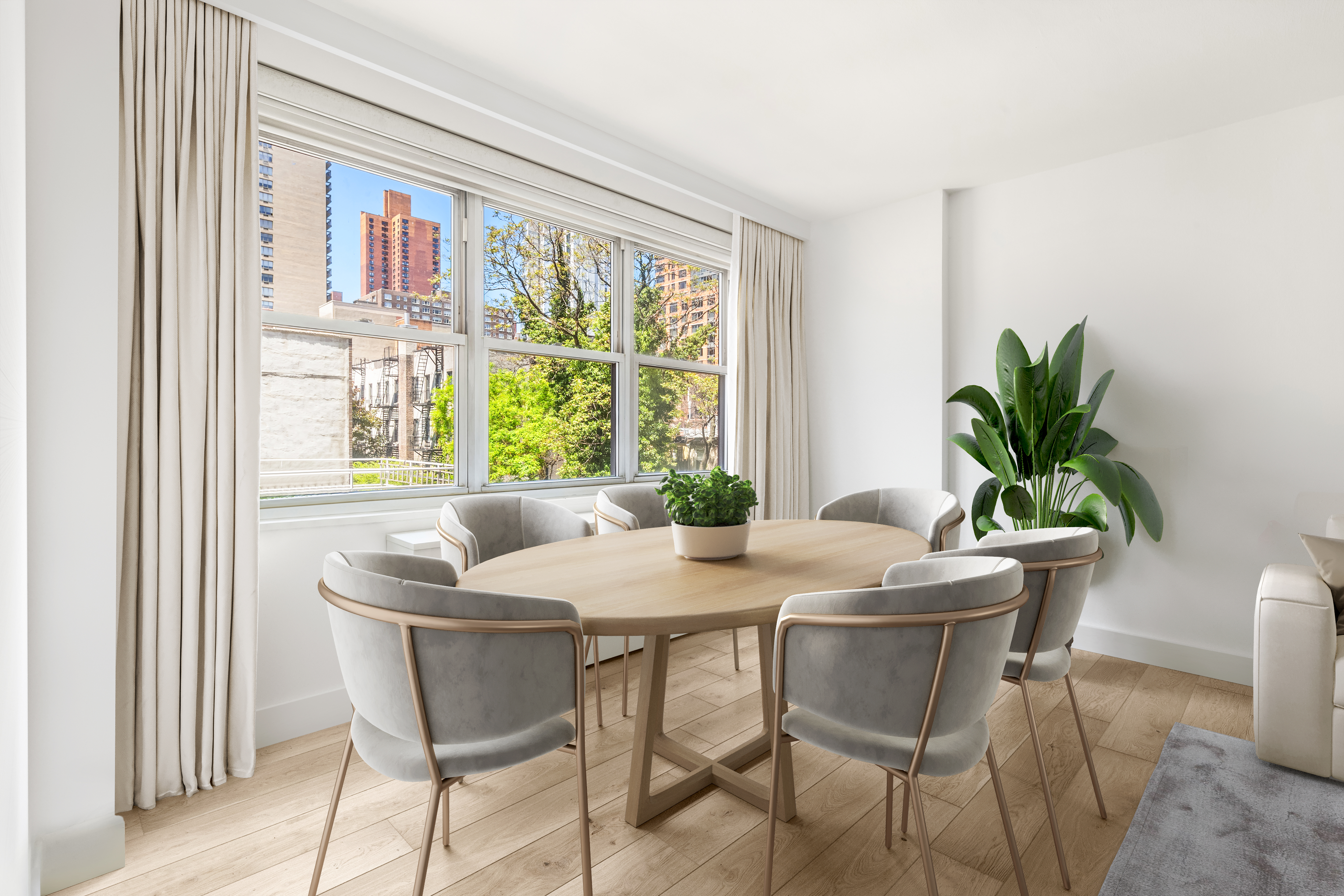 251 East 32nd Street, Unit 5J Manhattan, NY 10016 - Photo 2 of 15 a view of a dining room with furniture window and outside view