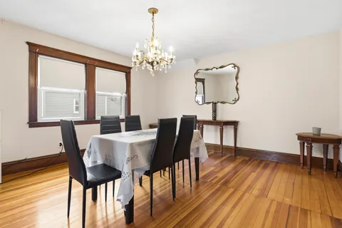 a view of a large window with wooden floor