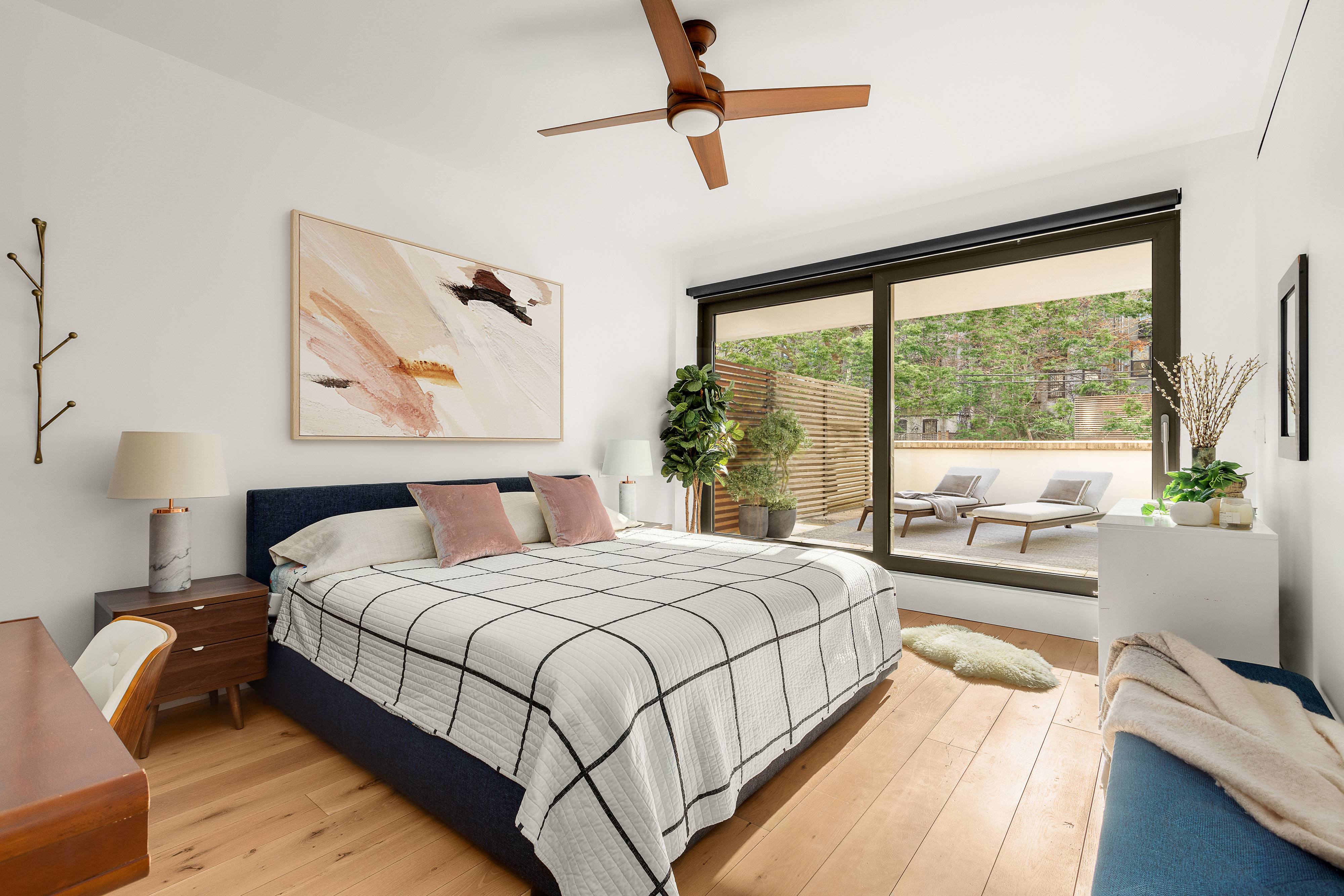 280 Saint Marks Avenue, Unit TH-E Brooklyn, NY 11238 - Photo 7 of 10 a bedroom with a large bed and a large window