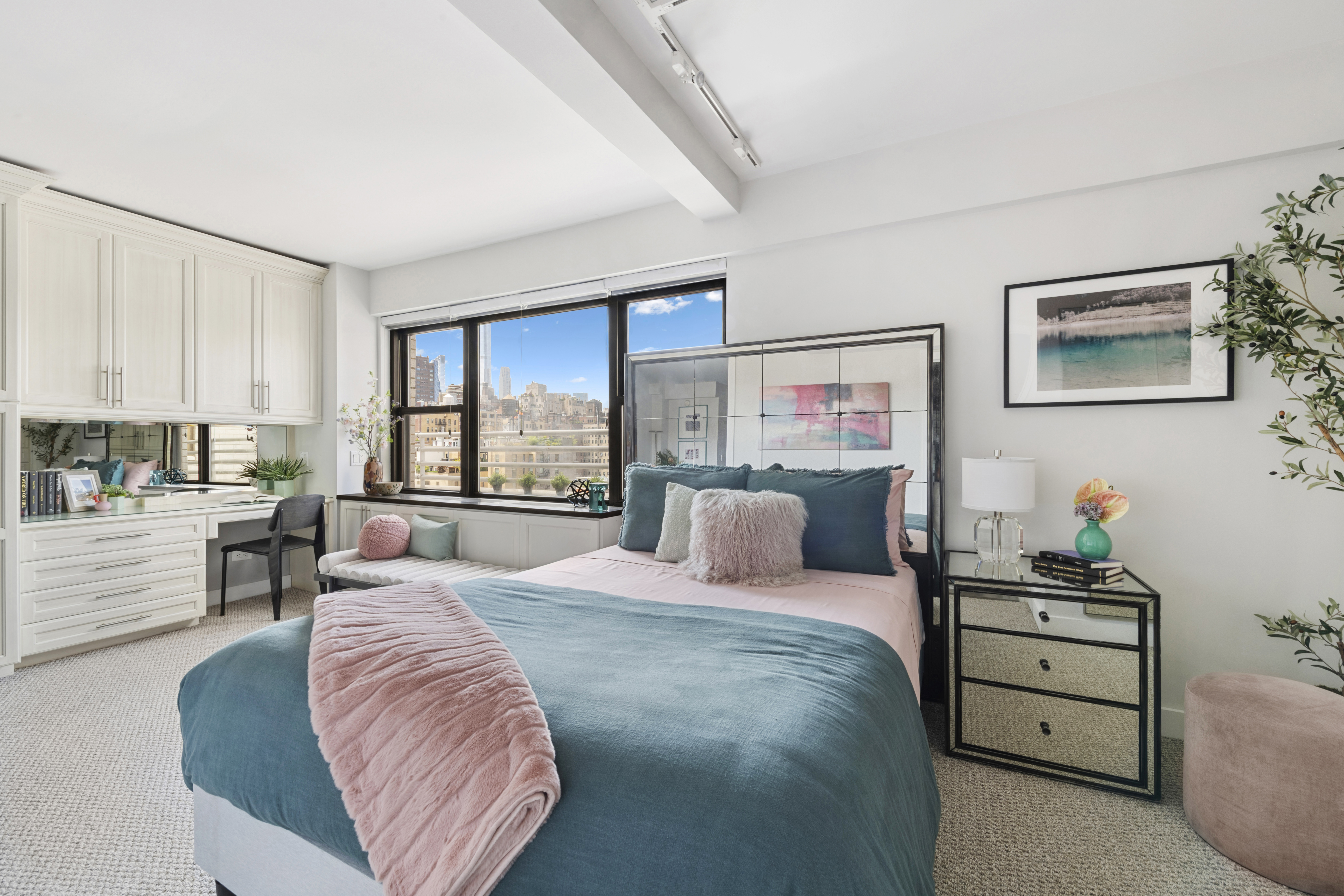 196 East 75th Street, Unit 16G Manhattan, NY 10021 - Photo 8 of 10 a living room with furniture and a large window