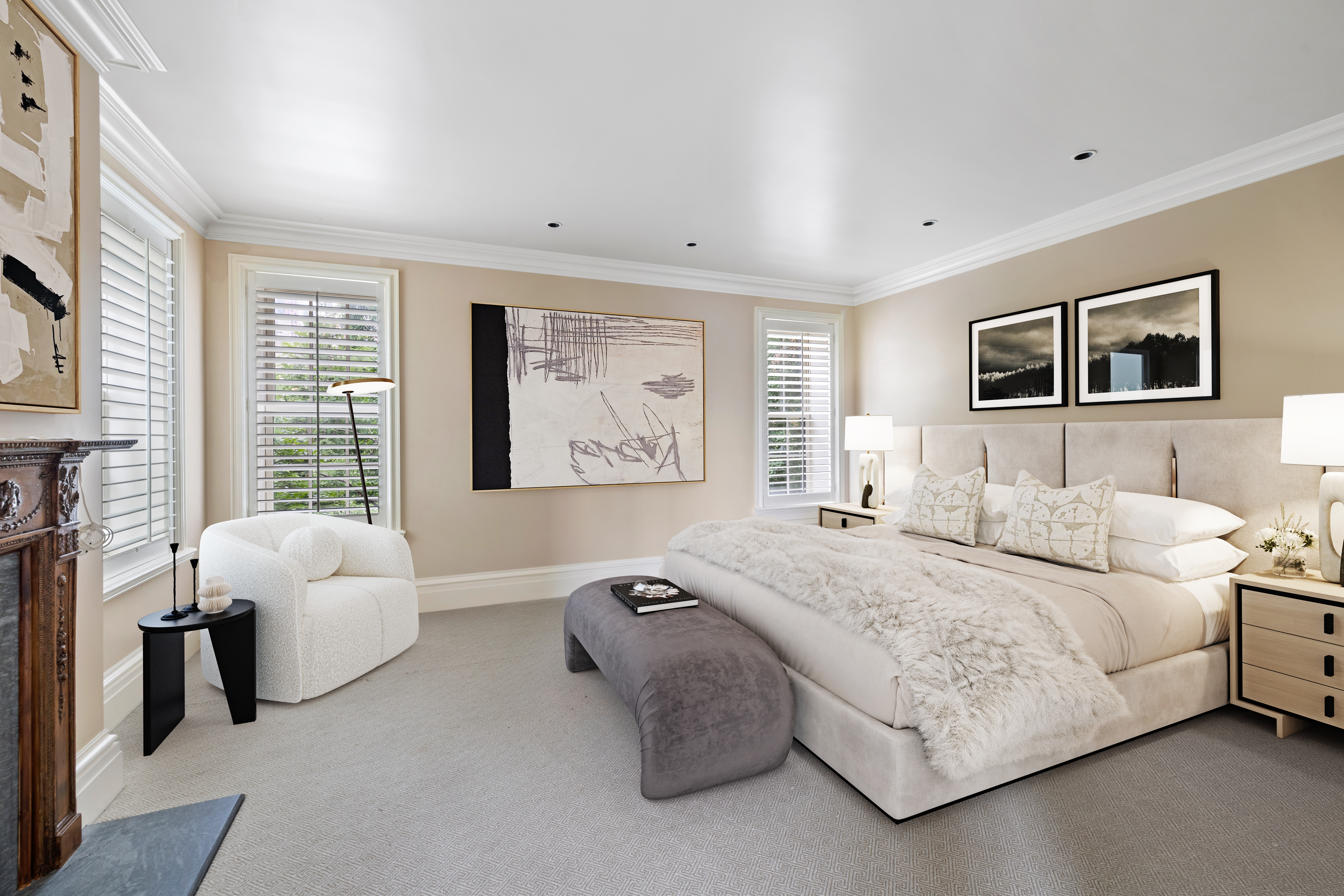 21 Beekman Place Manhattan, NY 10022 - Photo 12 of 16 a bedroom with bed and a large window