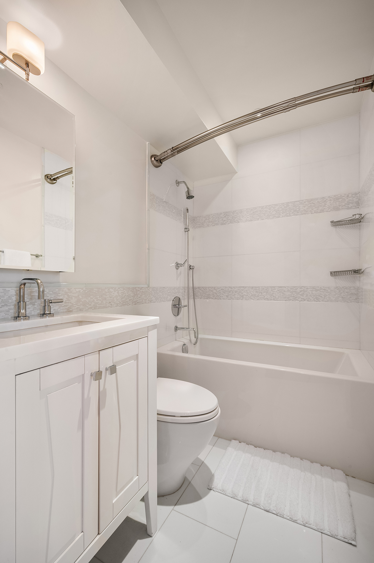 366 West 11th Street, Unit PHF Manhattan, NY 10014 - Photo 13 of 28 a bathroom with a sink a toilet and a bathtub