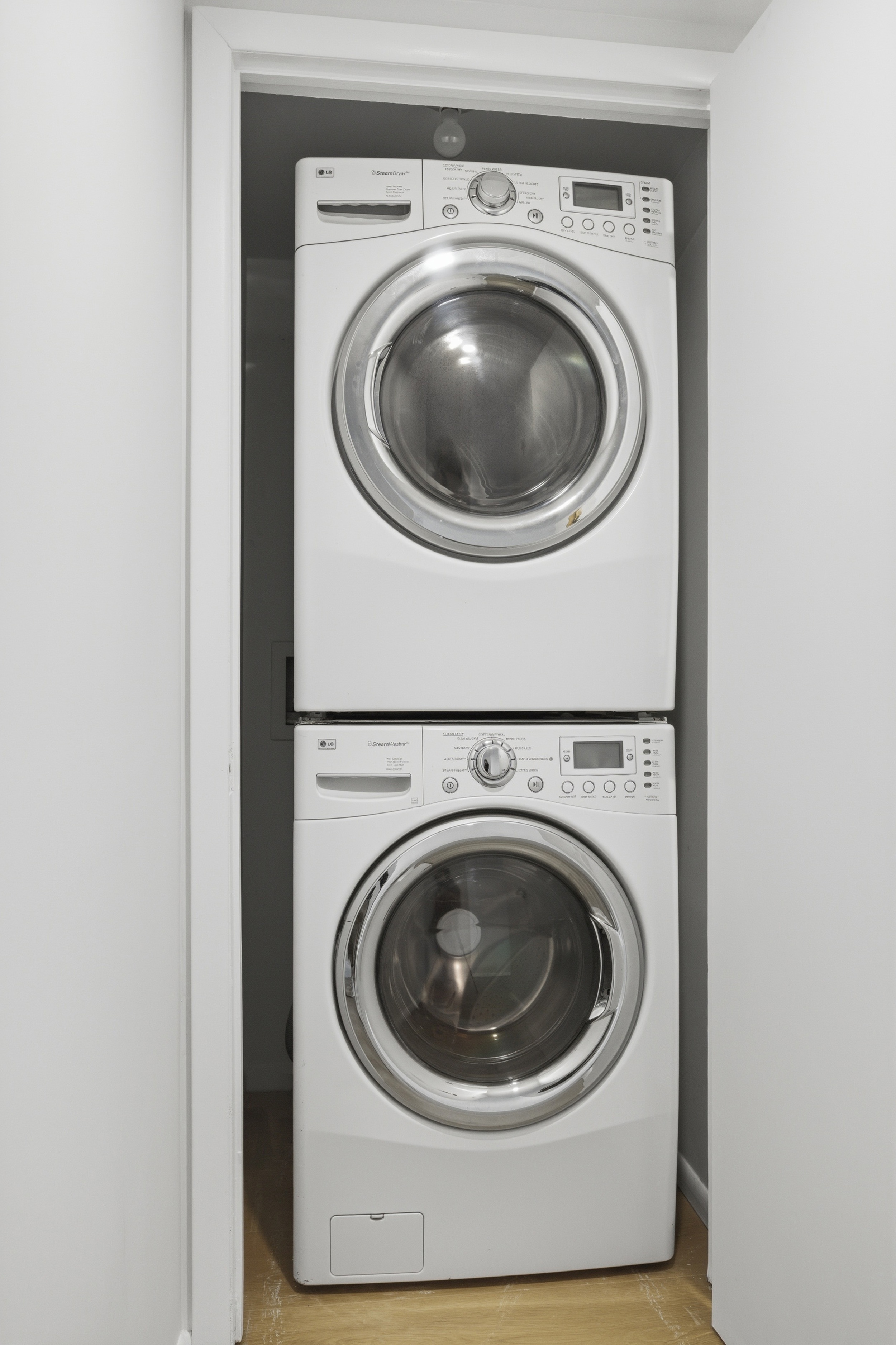 433 Warren Street, Unit 2C Brooklyn, NY 11217 - Photo 18 of 19 a utility room with dryer and washer