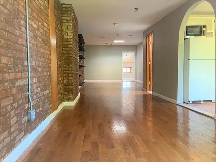 a view of livingroom with wooden floor